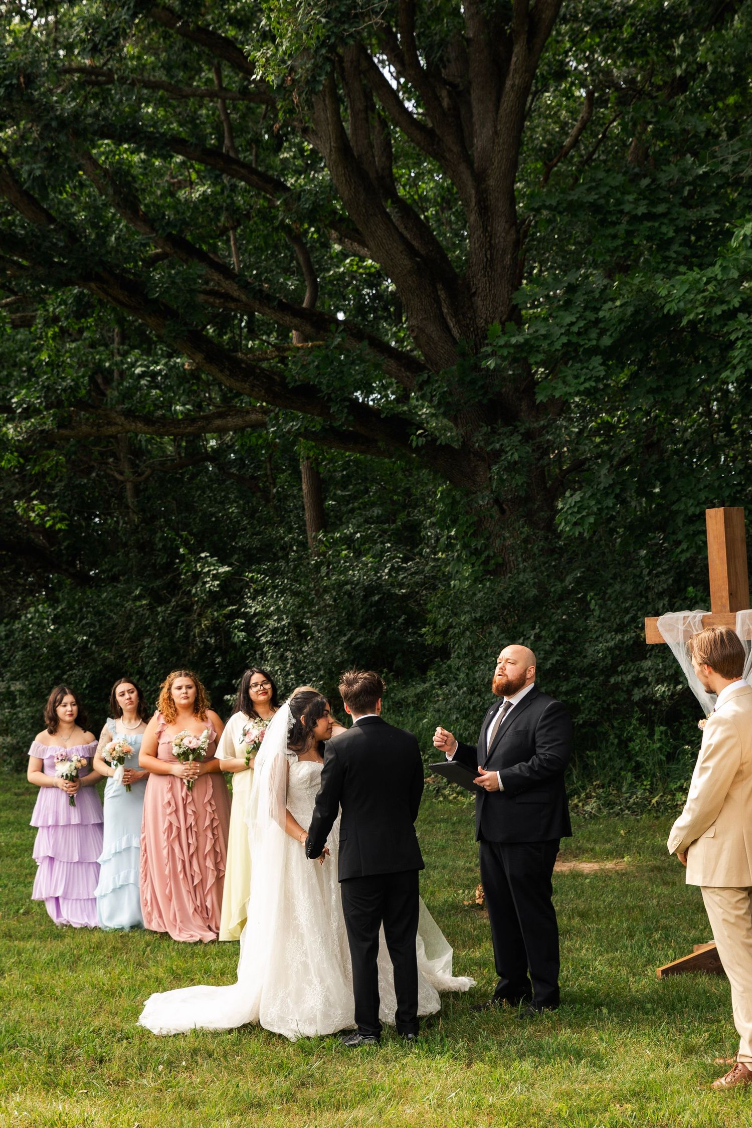 Romantic outdoor summer wedding on 35MM film photographer northern Indiana candid documentary true to life lush greens