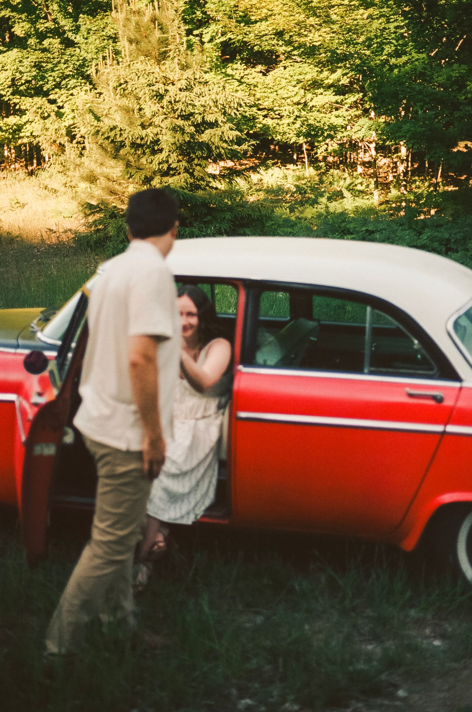Romantic gentle vintage summer engagement on 35MM film photographer northern Indiana candid documentary true to life lush greens