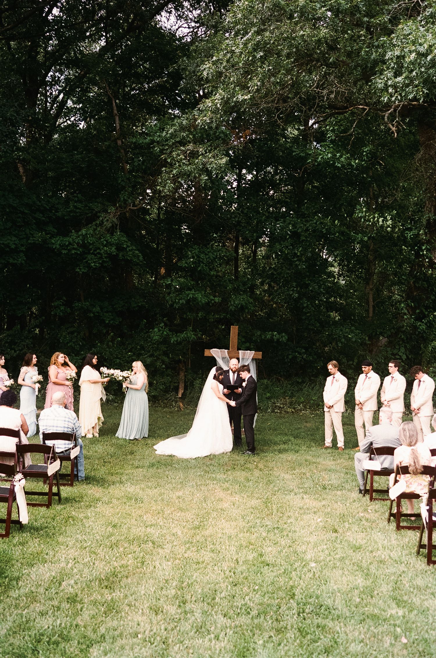 Romantic summer wedding on 35MM film photographer northern Indiana candid documentary true to life lush greens
