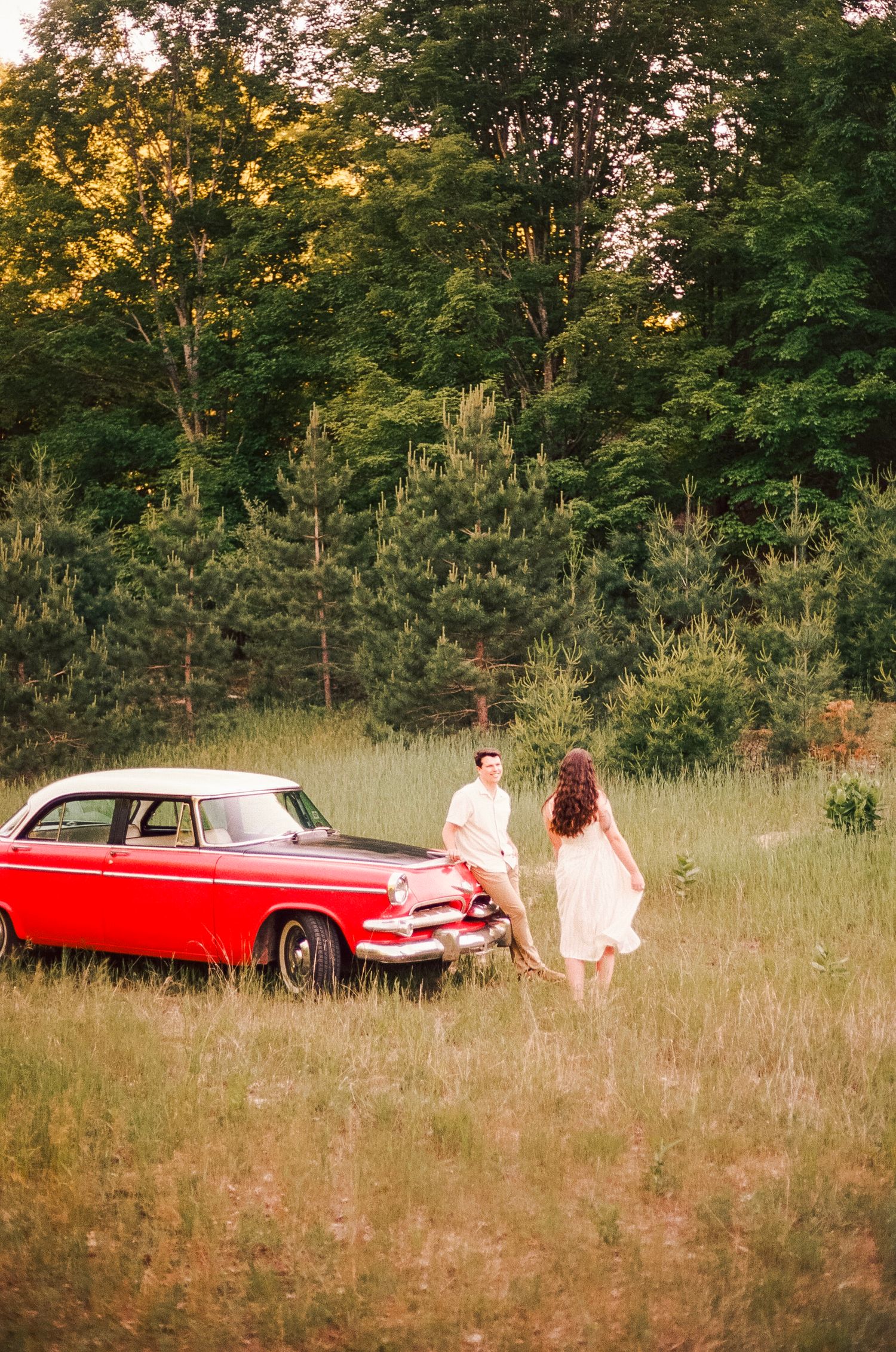 Romantic gentle summer engagement on 35MM film photographer northern Indiana candid documentary true to life golden sunlight lush greens