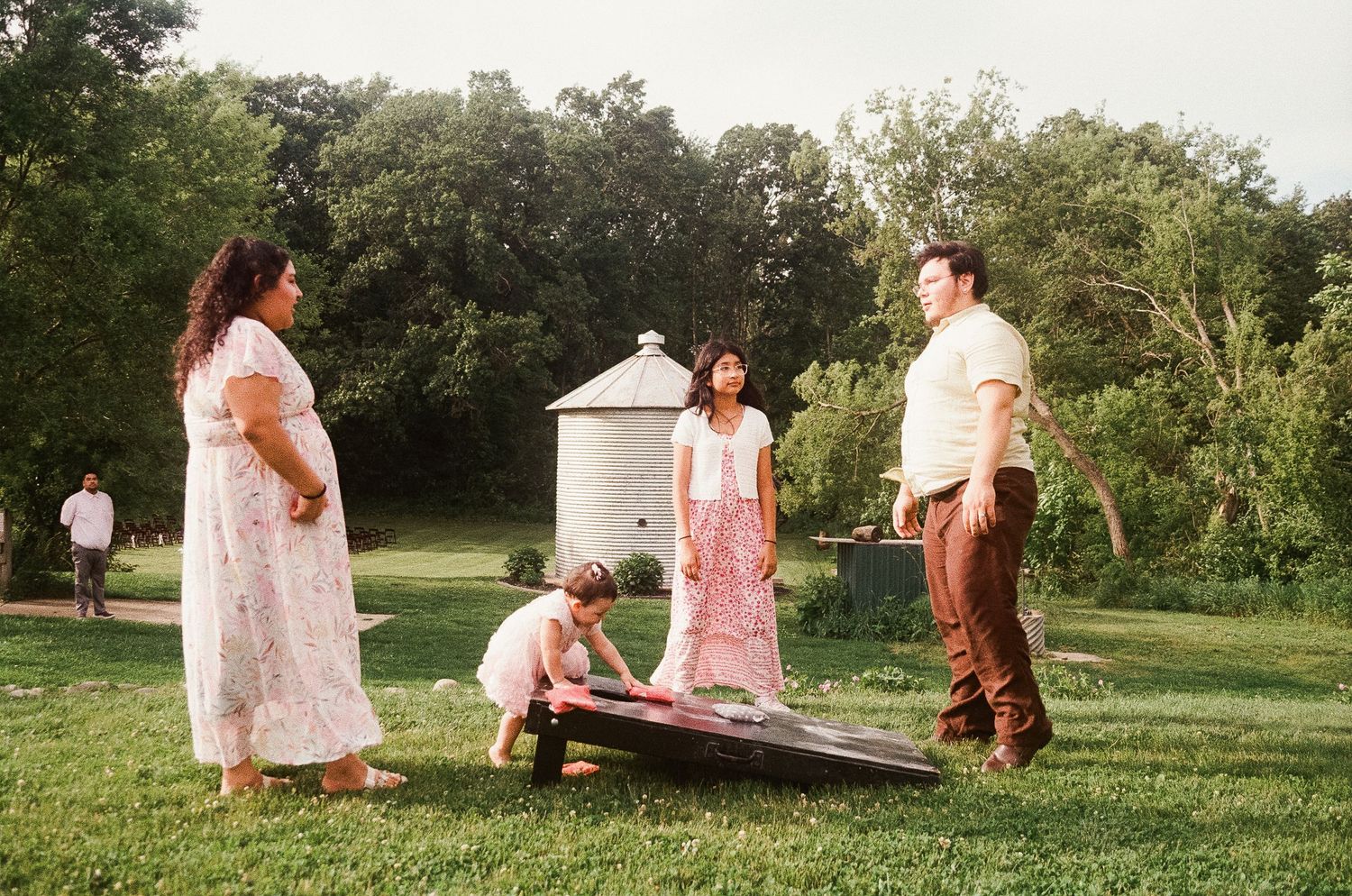 Romantic outdoor summer wedding on 35MM film photographer northern Indiana candid documentary true to life lush greens