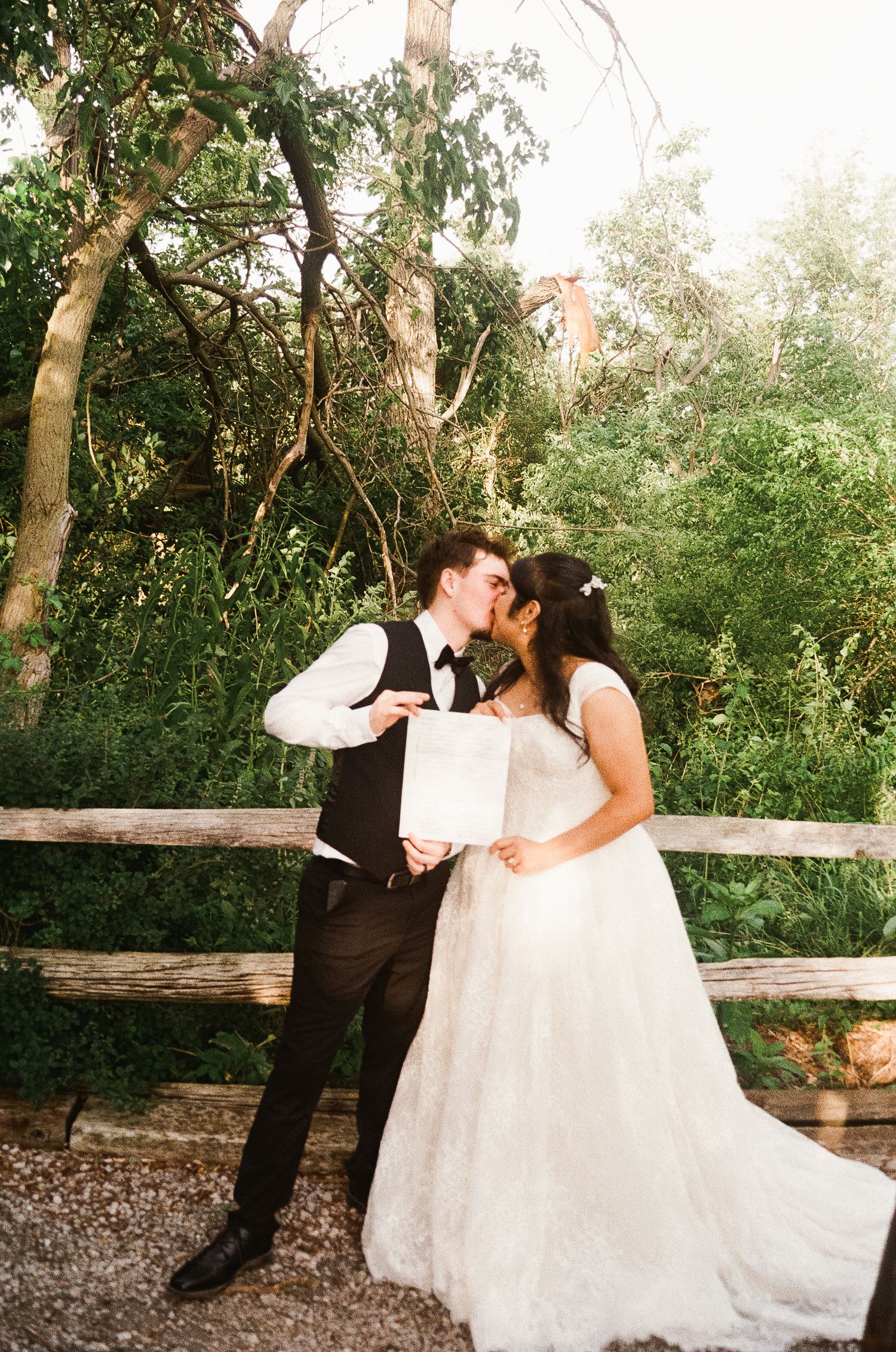 Romantic outdoor summer wedding on 35MM film photographer northern Indiana candid documentary true to life lush greens