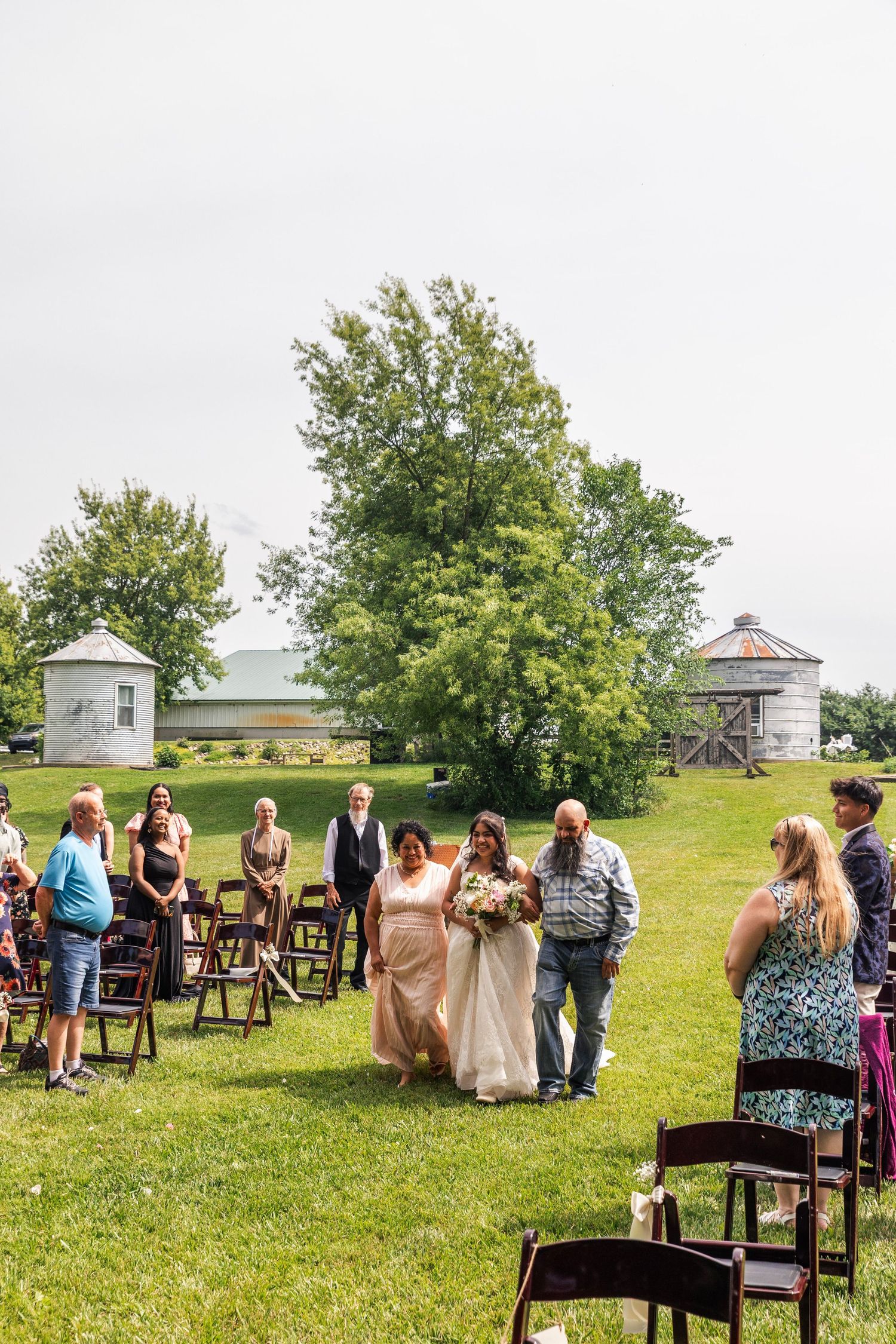 Romantic outdoor summer wedding on 35MM film photographer northern Indiana candid documentary true to life lush greens