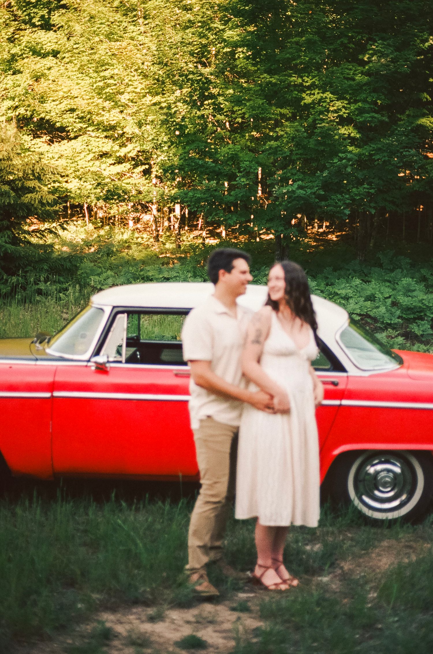 Romantic gentle summer engagement on 35MM film photographer northern Indiana candid documentary true to life golden sunlight lush greens