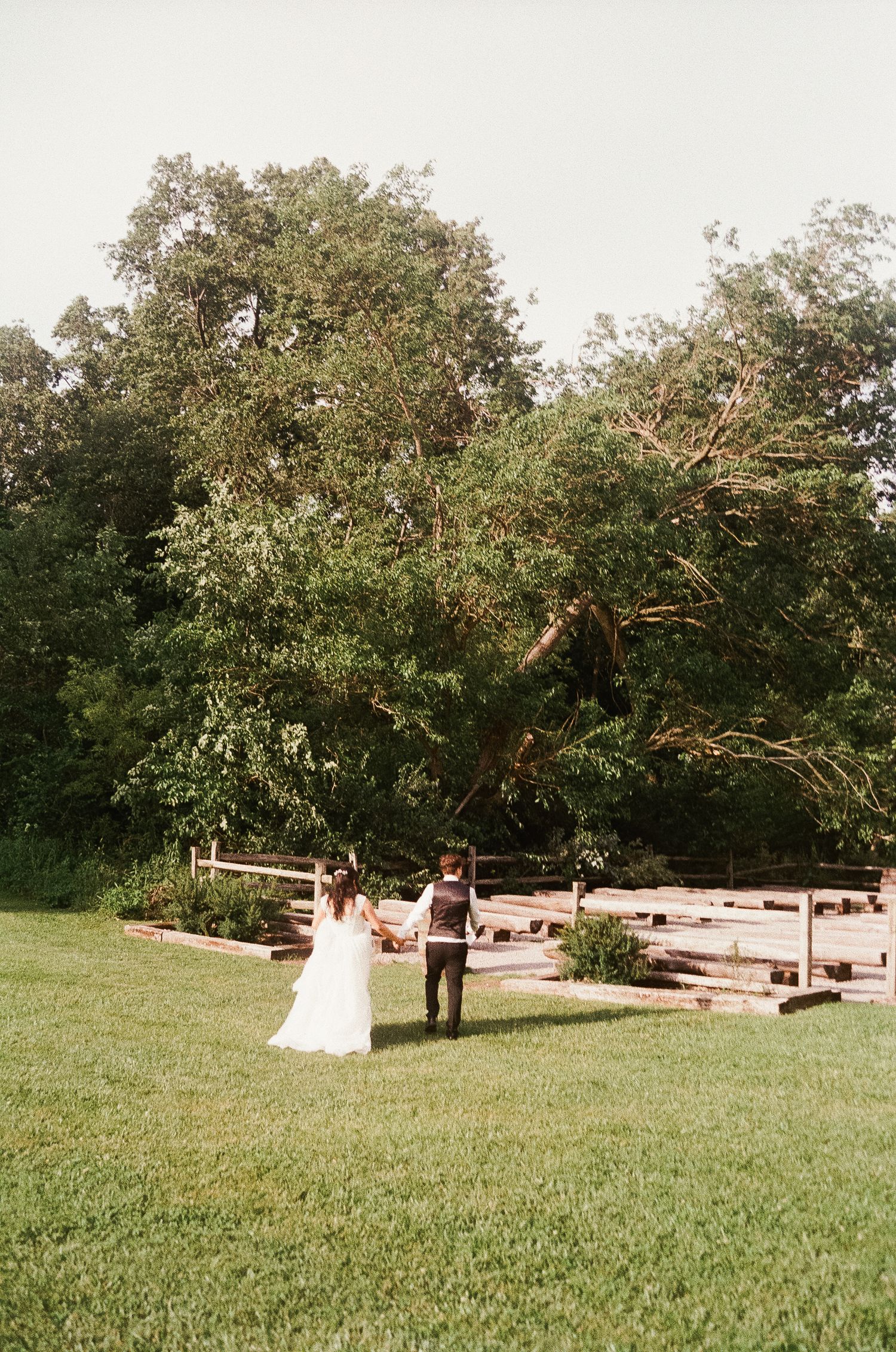 Romantic outdoor summer wedding on 35MM film photographer northern Indiana candid documentary true to life lush greens