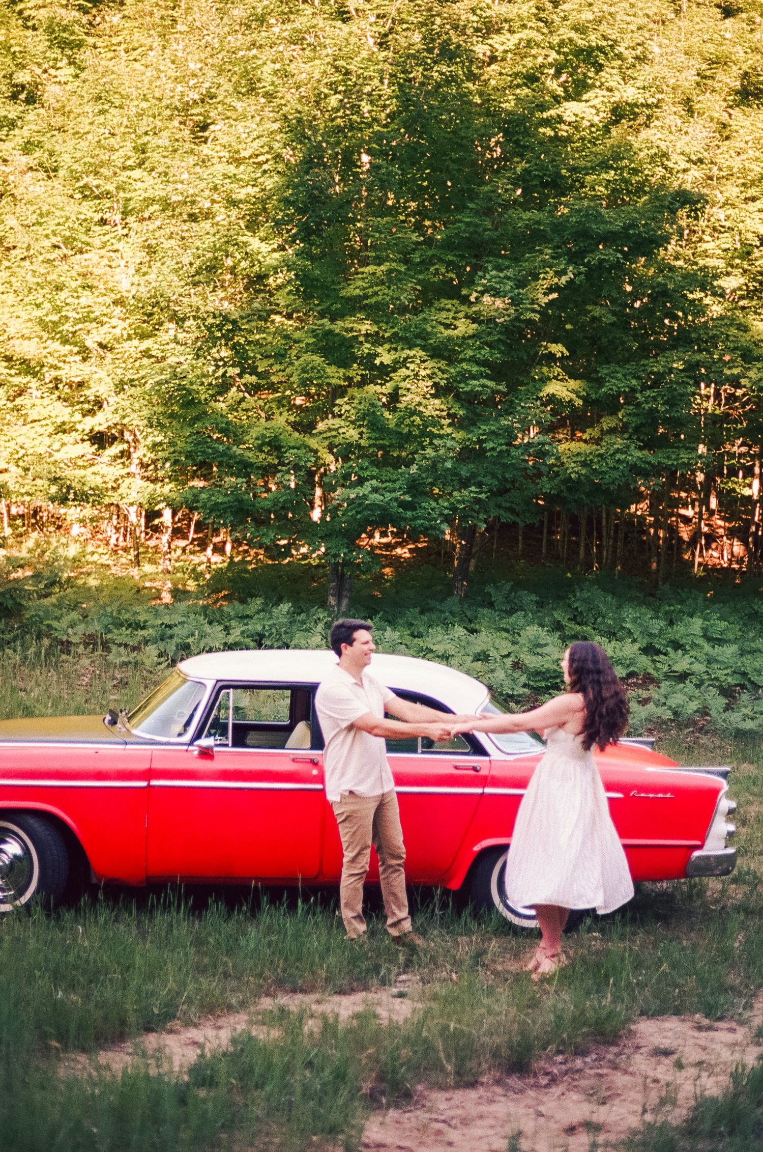 Romantic gentle summer engagement on 35MM film photographer northern Indiana candid documentary true to life golden sunlight lush greens