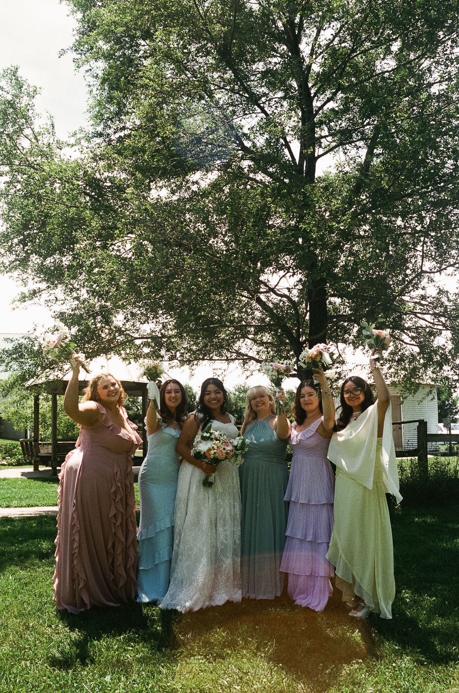 Romantic summer wedding on 35MM film photographer northern Indiana candid documentary true to life lush greens