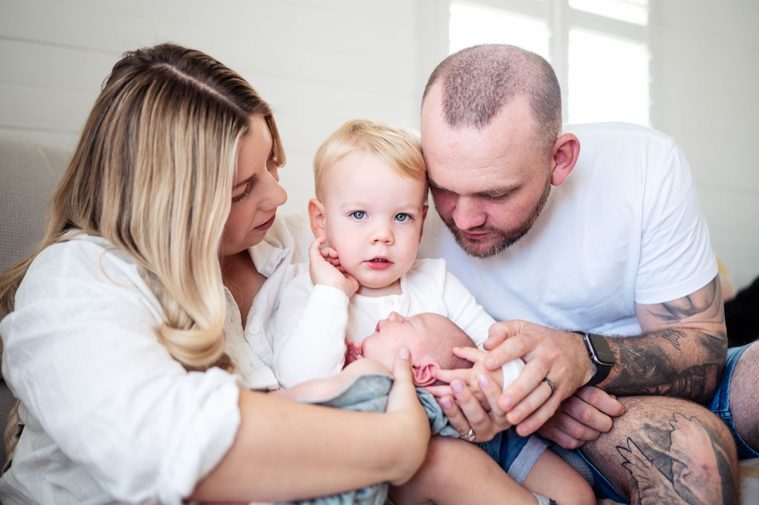 Sweet indoor family moments captured in soft natural window light.