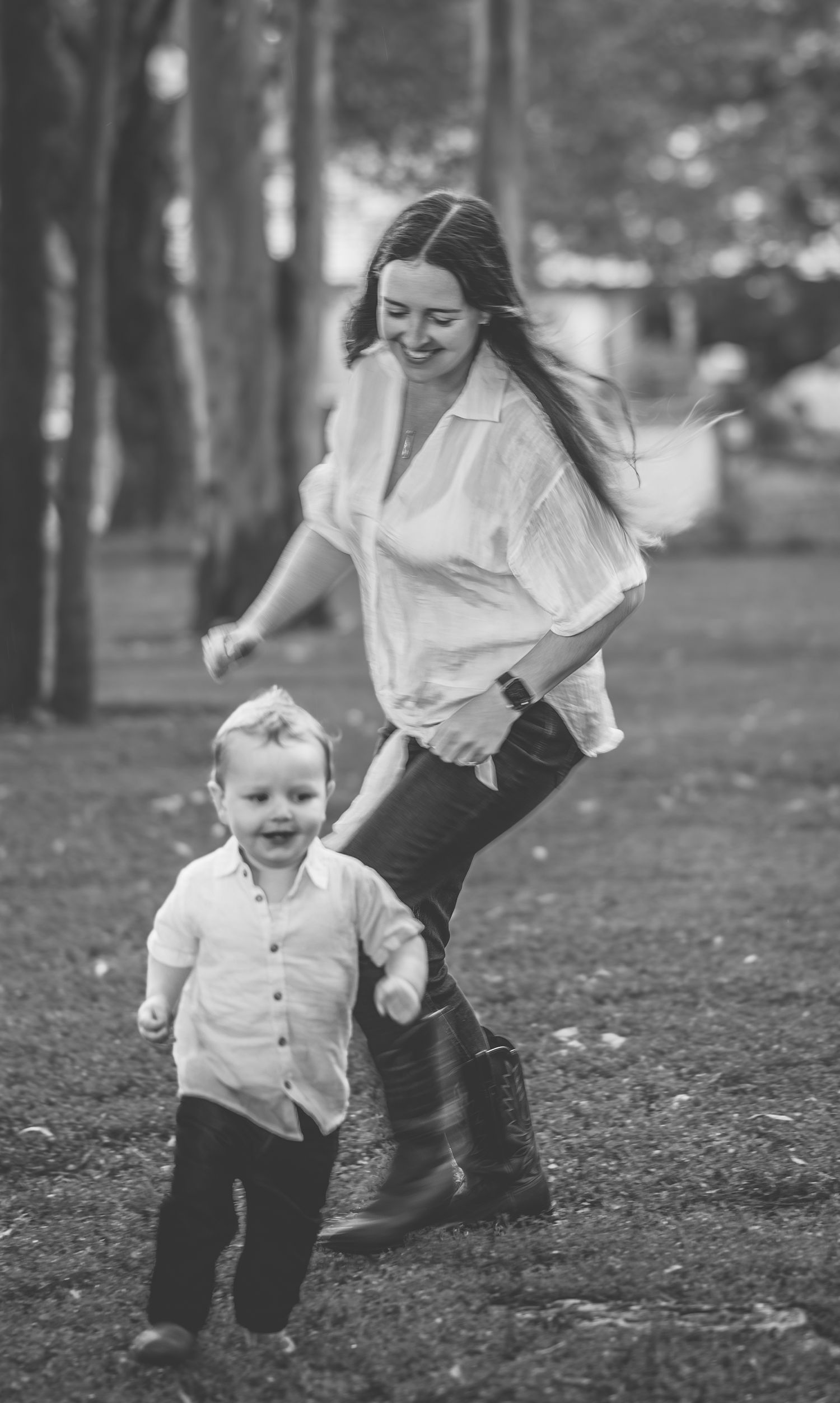 Black and white photos of joyful running and playing in a park setting.