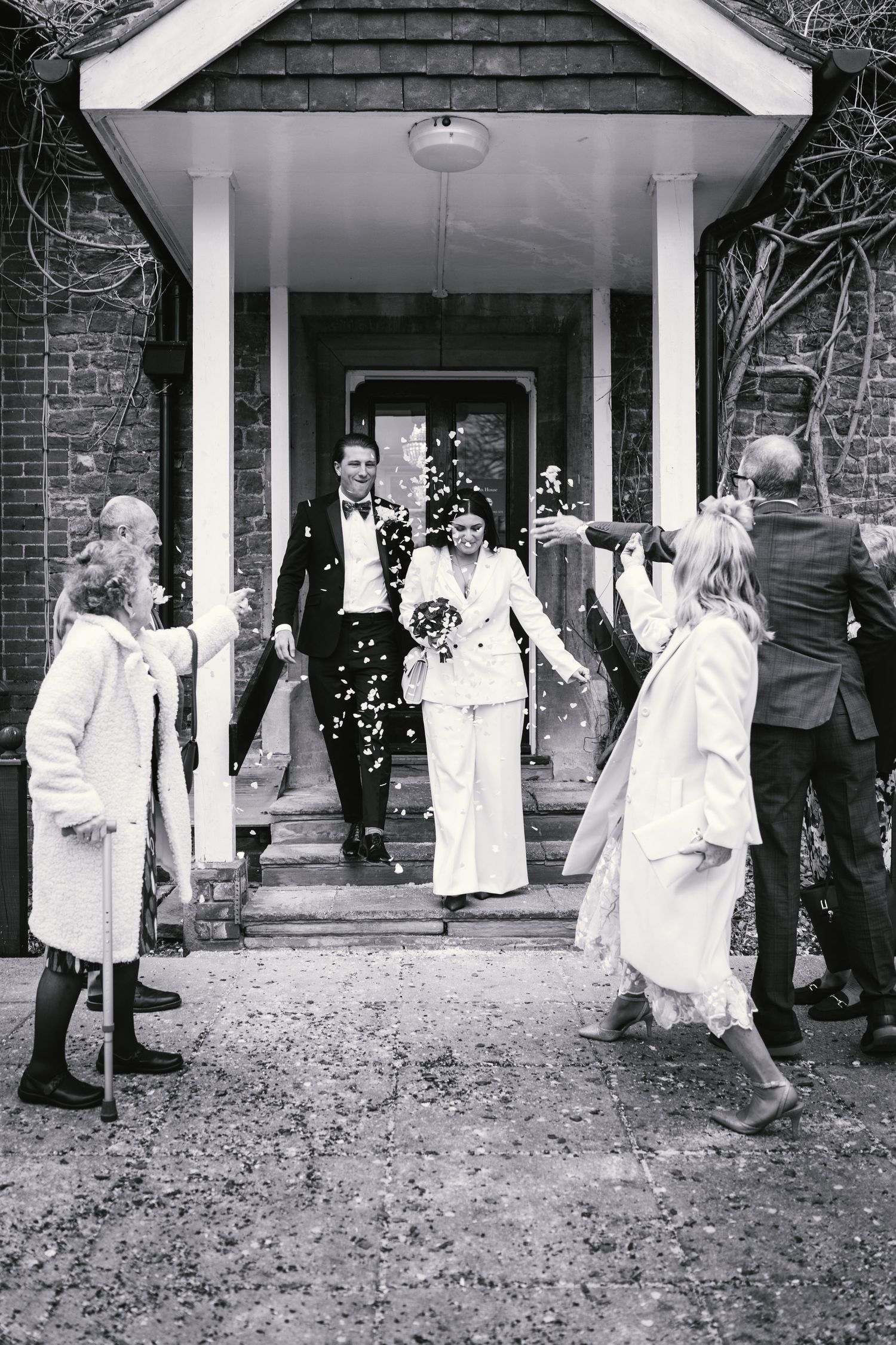 Bride and groom confetti exit after the ceremony