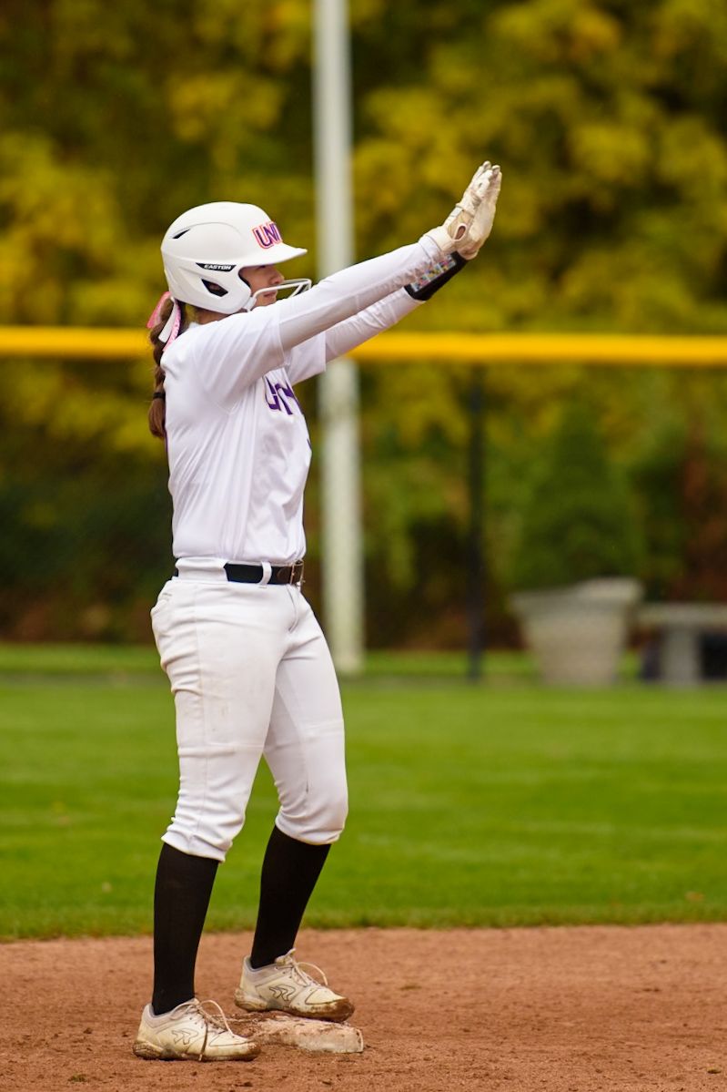 Travel softball player during a club softball game in Southeastern Massachusetts