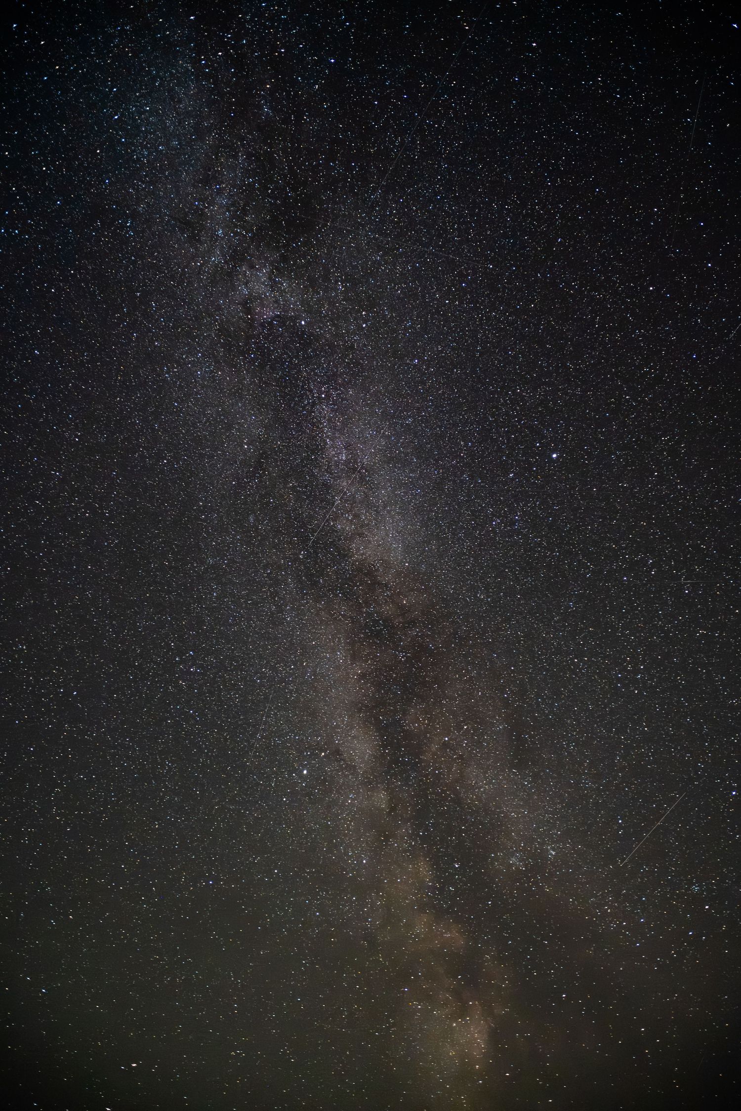 Stunning Milky Way galaxy with thousands of stars visible in a dark night sky.