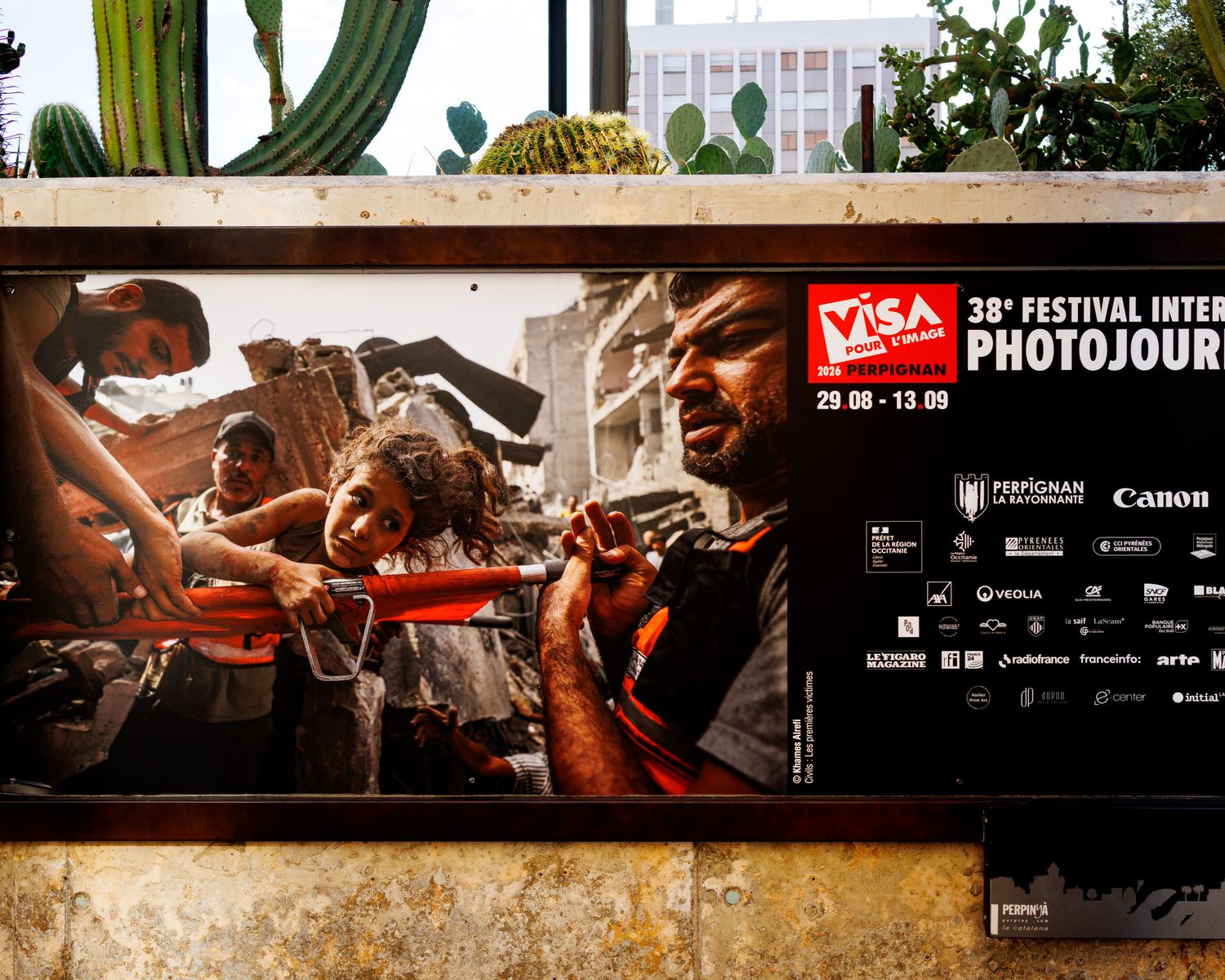 Banner for the 38th Visa Pour l Image International Photojournalism Festival in Perpignan with Canon sponsor.