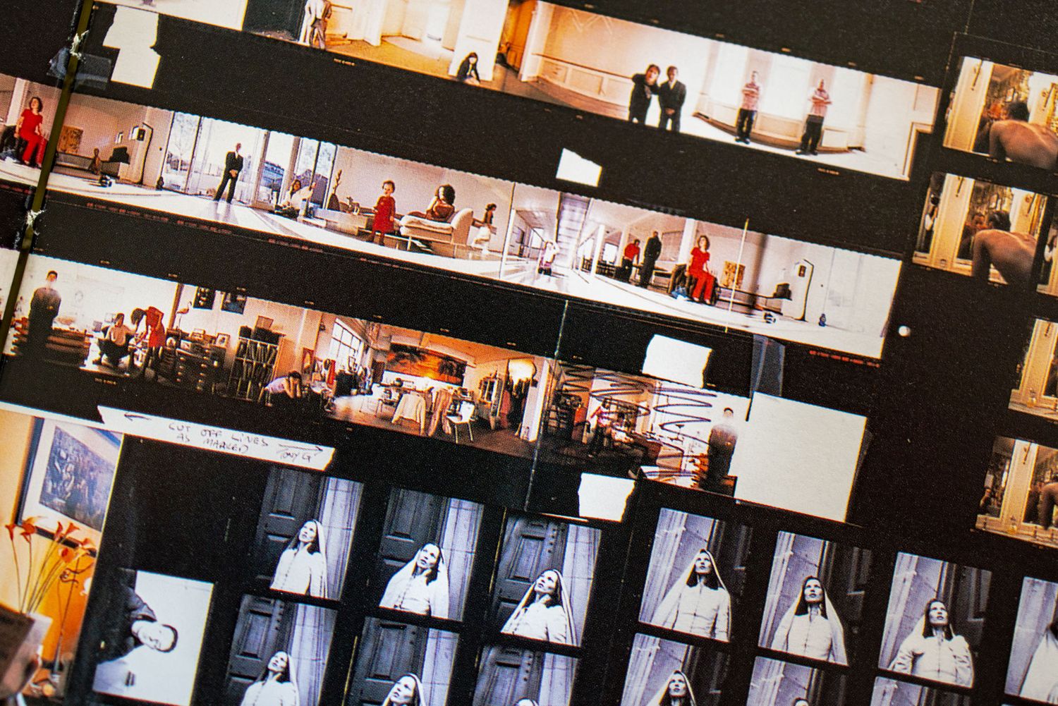 Contact sheet of film photographs showing multiple scenes with people in formal attire in an interior setting.