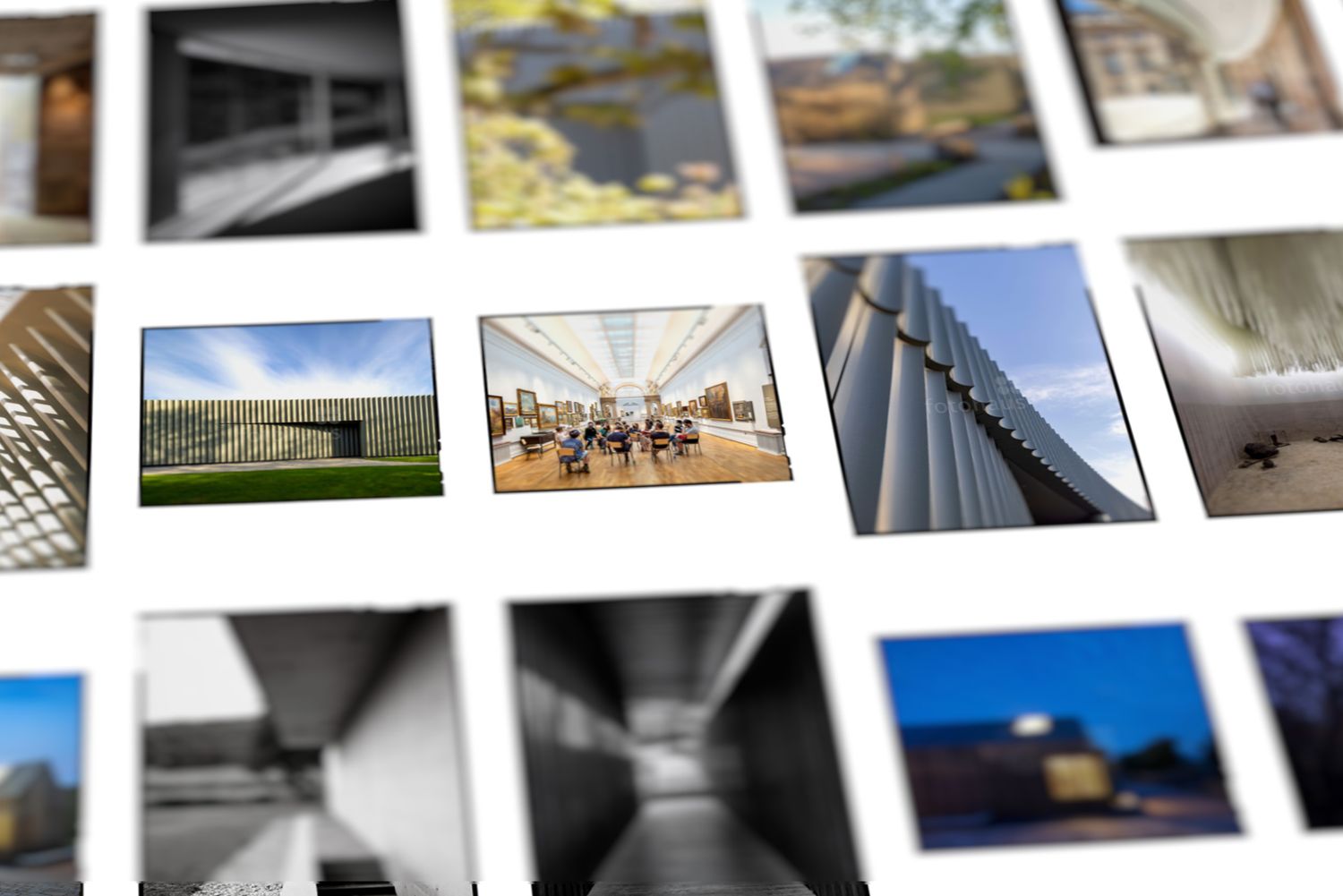 A collage of architectural photography prints arranged on a white surface showcasing modern buildings and interiors.