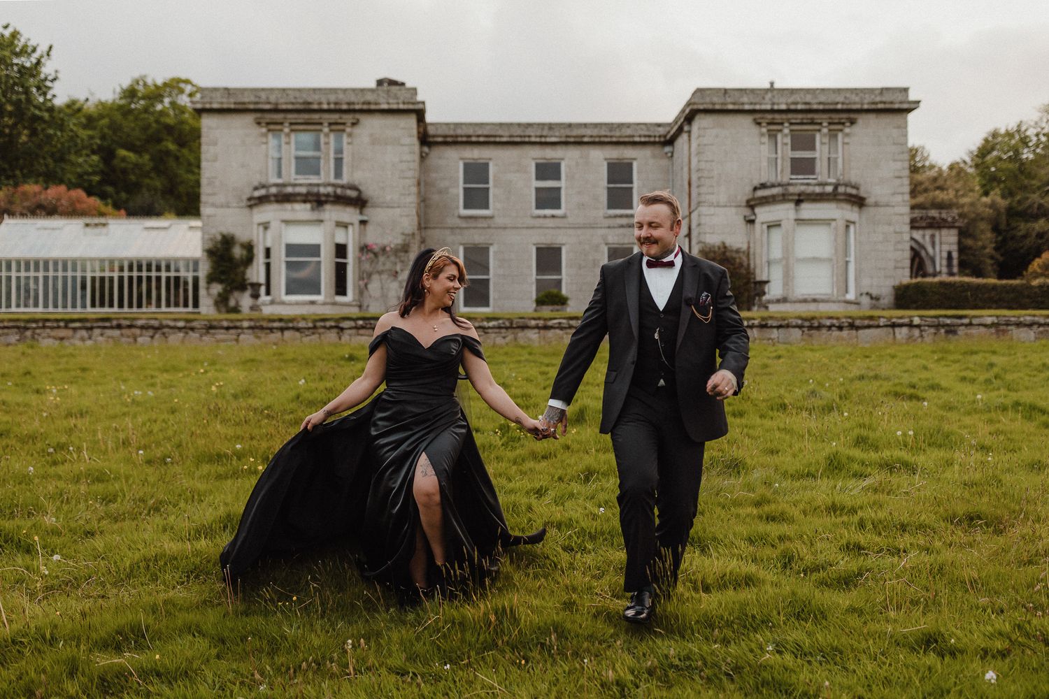 Dark Romance Alternative Style Cornwall Elopement at Scorrier House, Black Wedding Dress outside in Gardens.