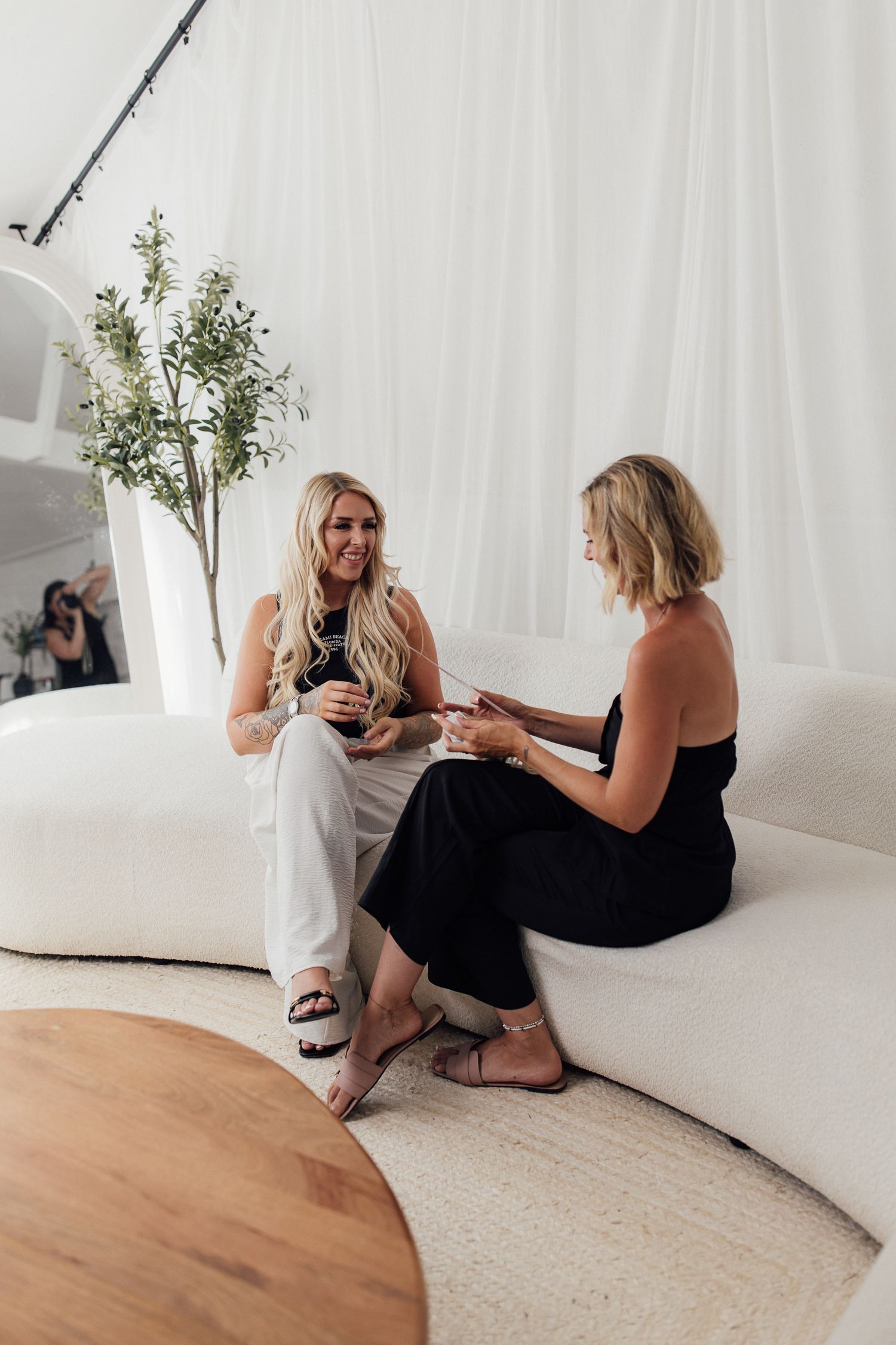 Light and airy business branding photo of client meeting for Chloe Horey hairstylist in Hayle,