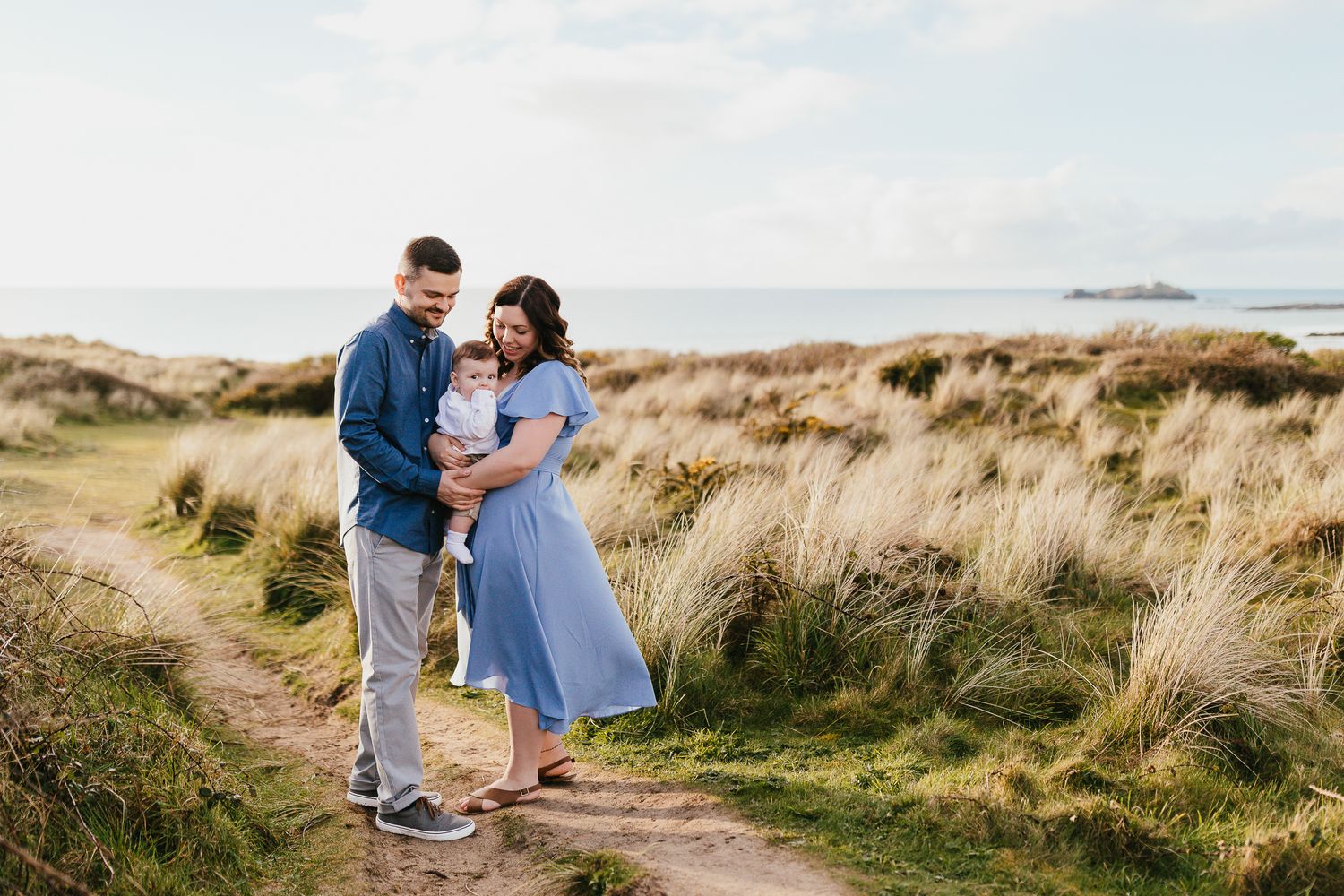 Baby 1st Birthday family photo session outdoors. Gwithian Godfrey Hayle Beach Golden Hour Sunset Lighthouse.