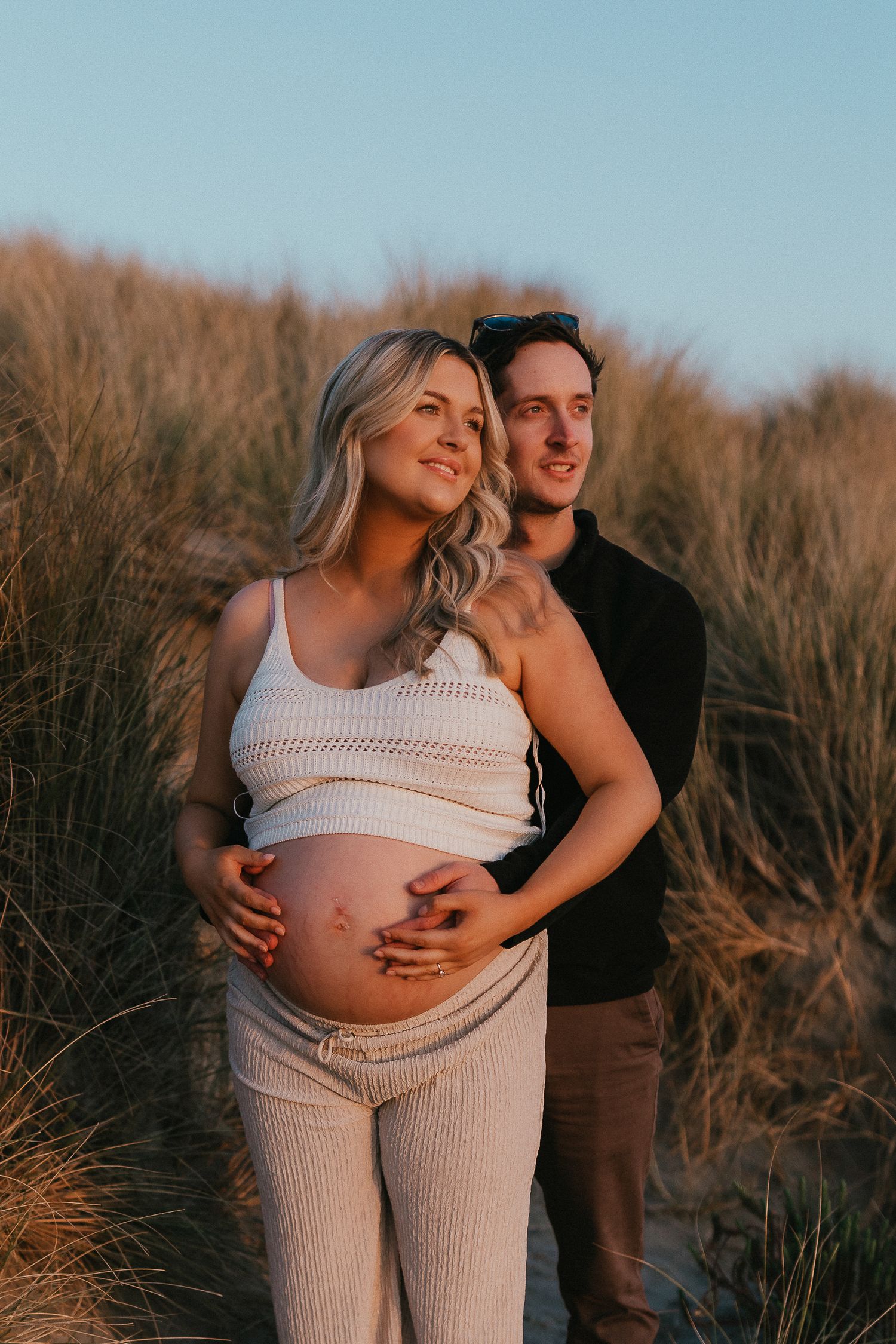 Cornwall Maternity Bump Couples Outdoor photoshoot beach evening sea Perranporth beach golden hour