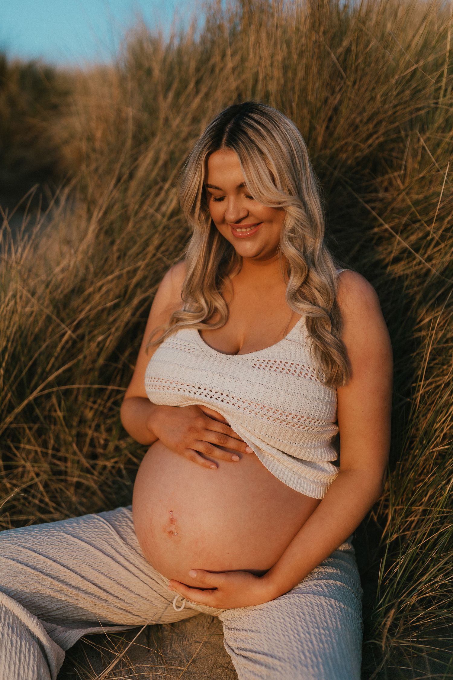 Cornwall Maternity Bump Outdoor photoshoot beach evening sea Perranporth beach golden hour