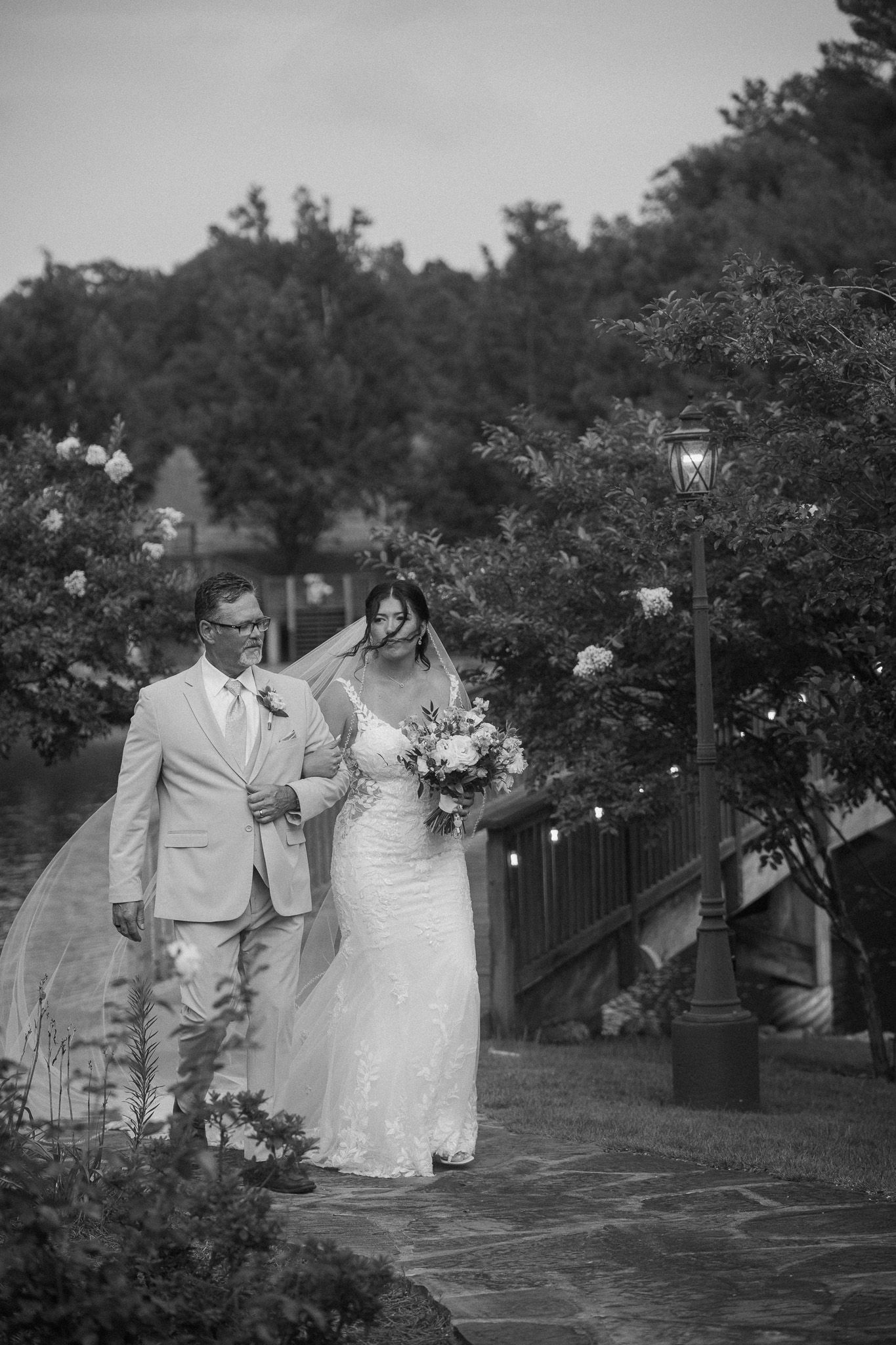 a father walking his daughter down the aisle