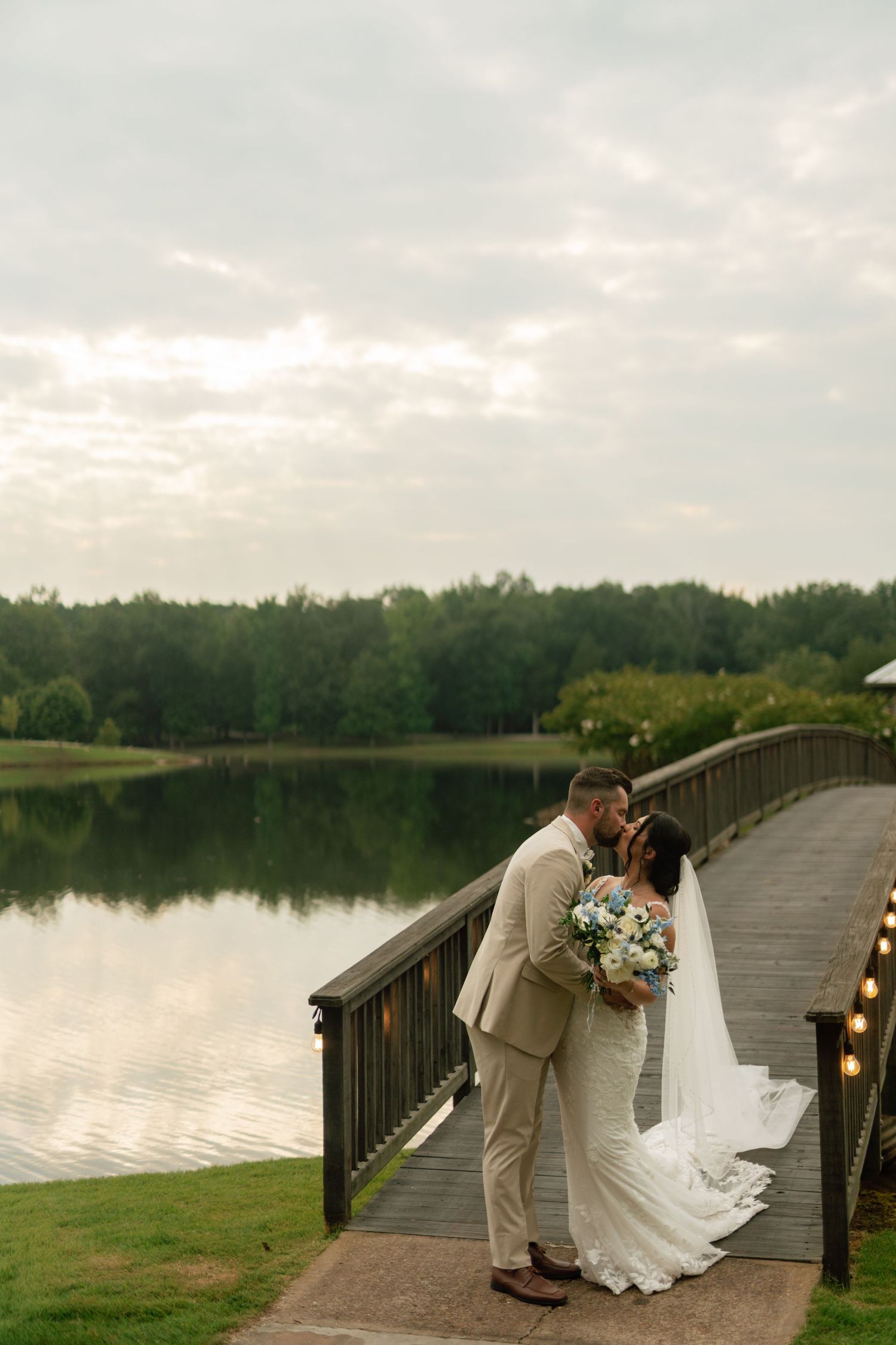 newlywed couple on bridge