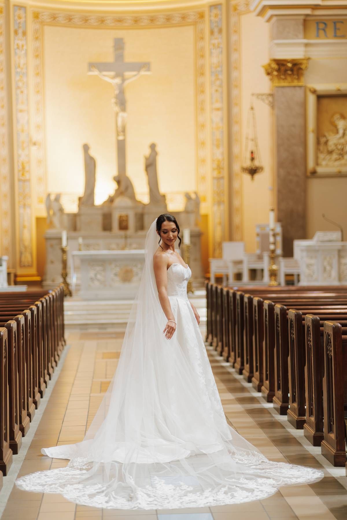 a bride in a cathedral on her wedding day
