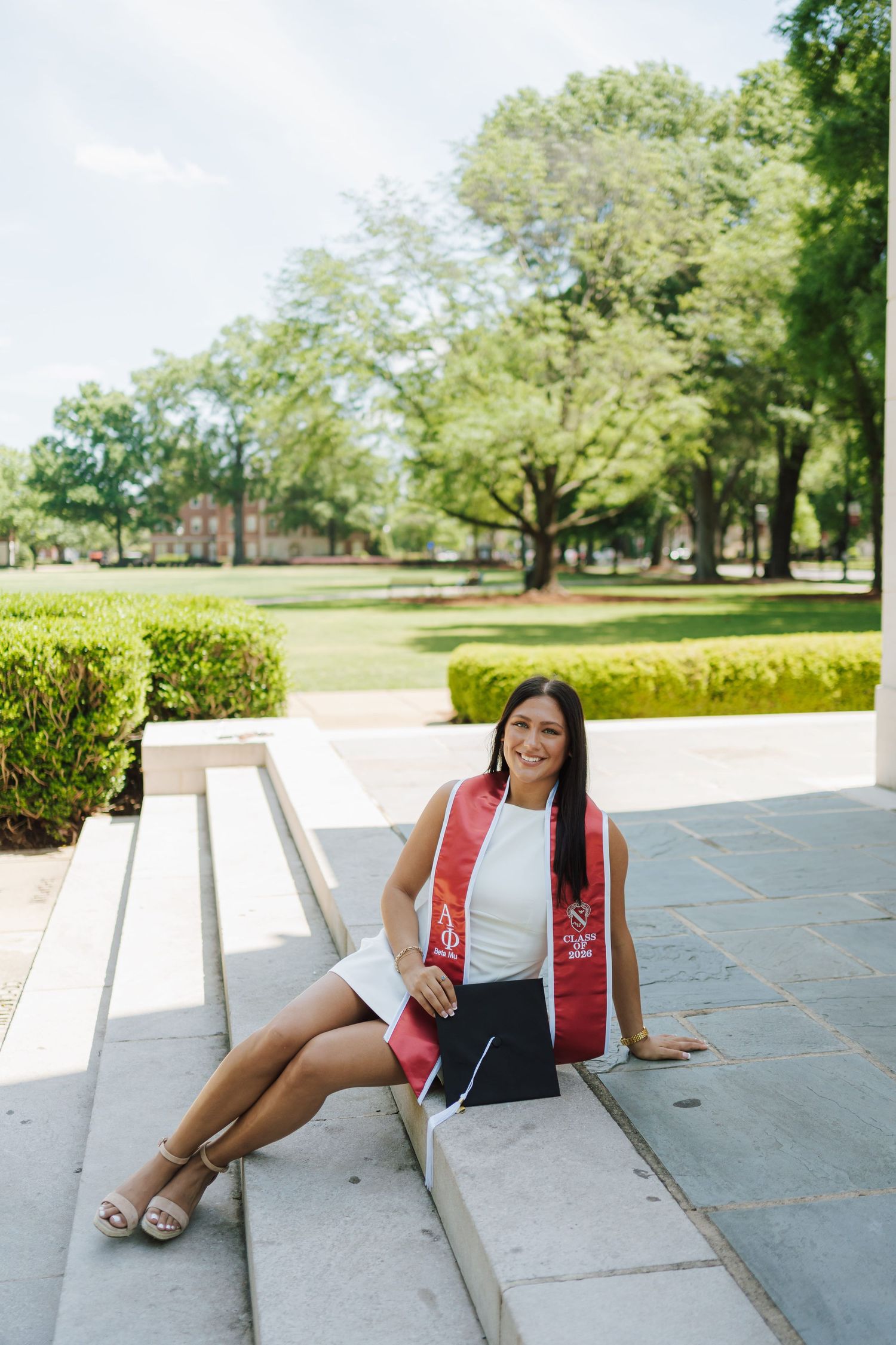 a college girl sitting on the stairs
