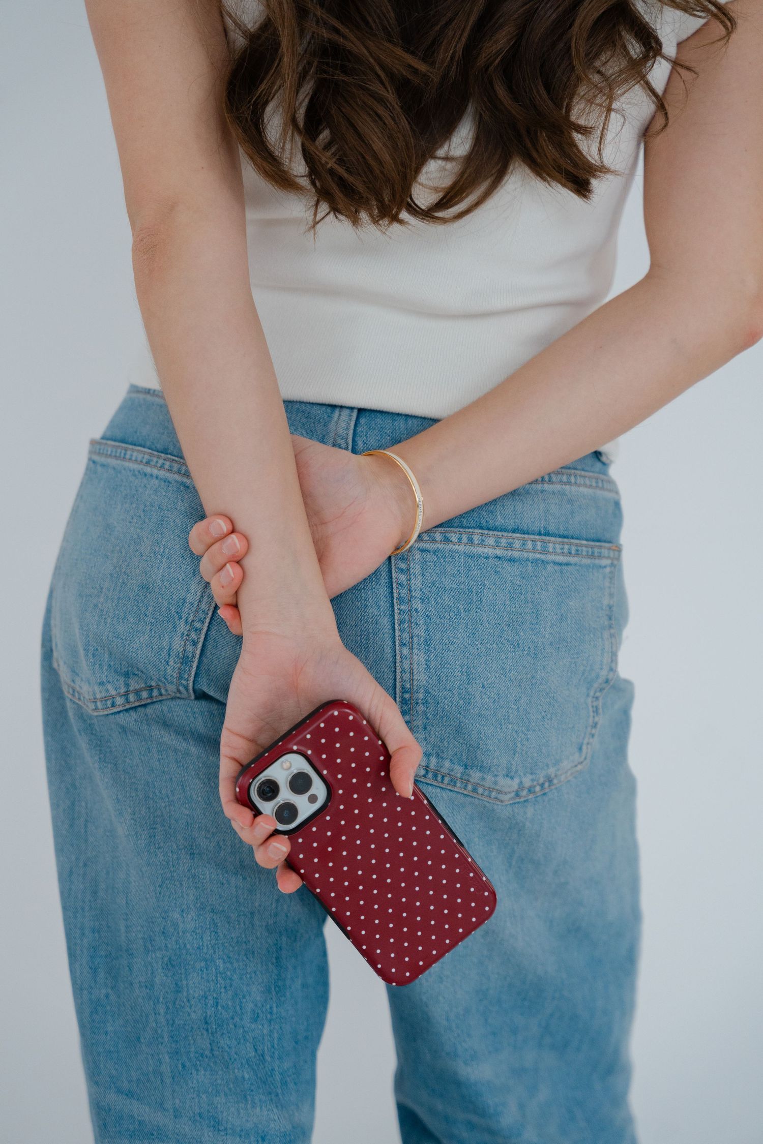 a girl holding her phone