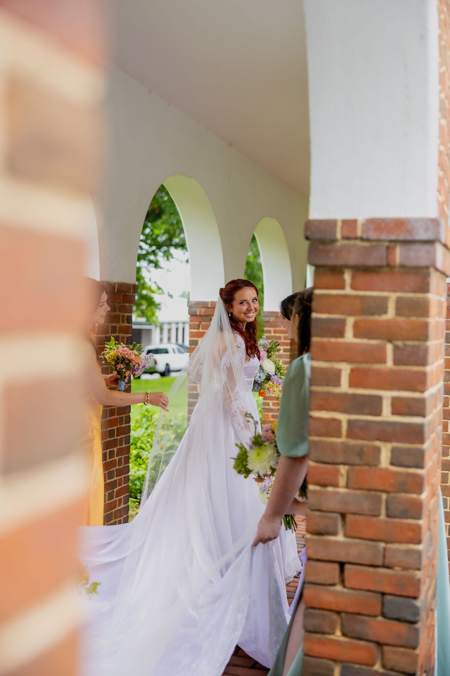 bride with her bridesmaids