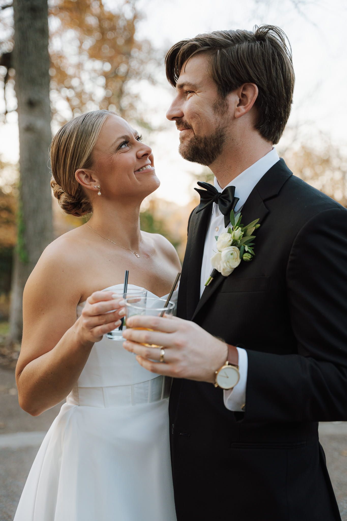 a newlywed couple enjoying drinks after getting married