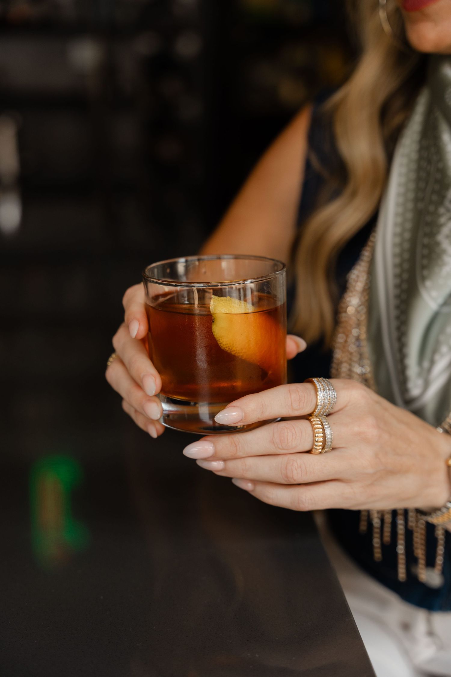 a person holding a drink