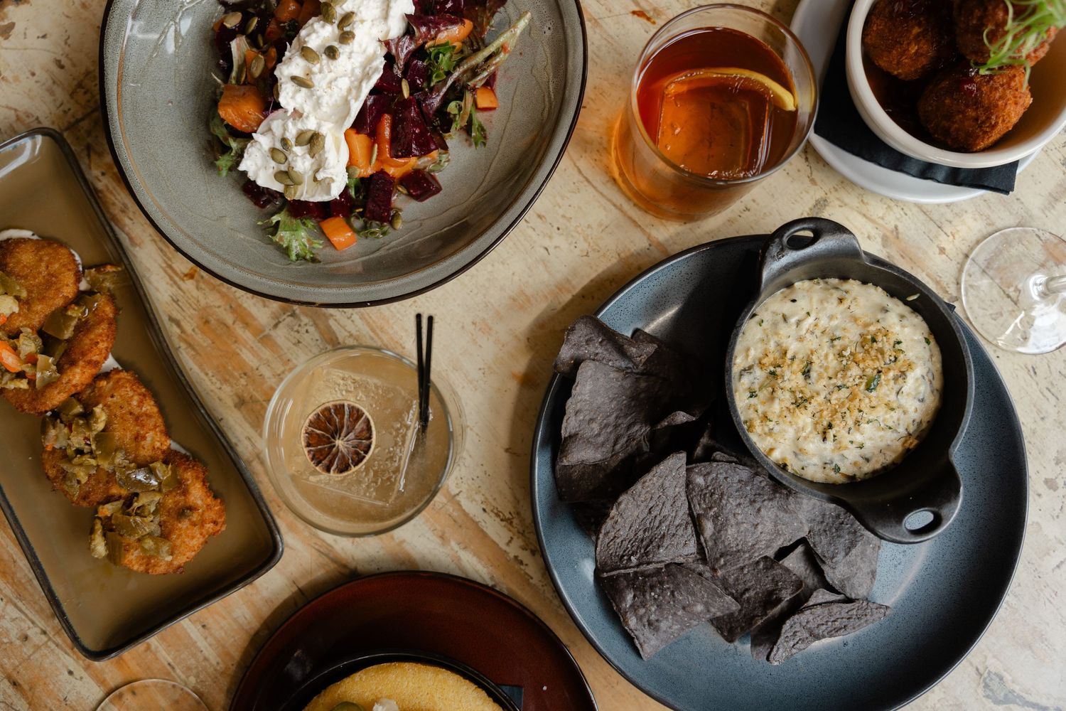 Different plates of food on a table