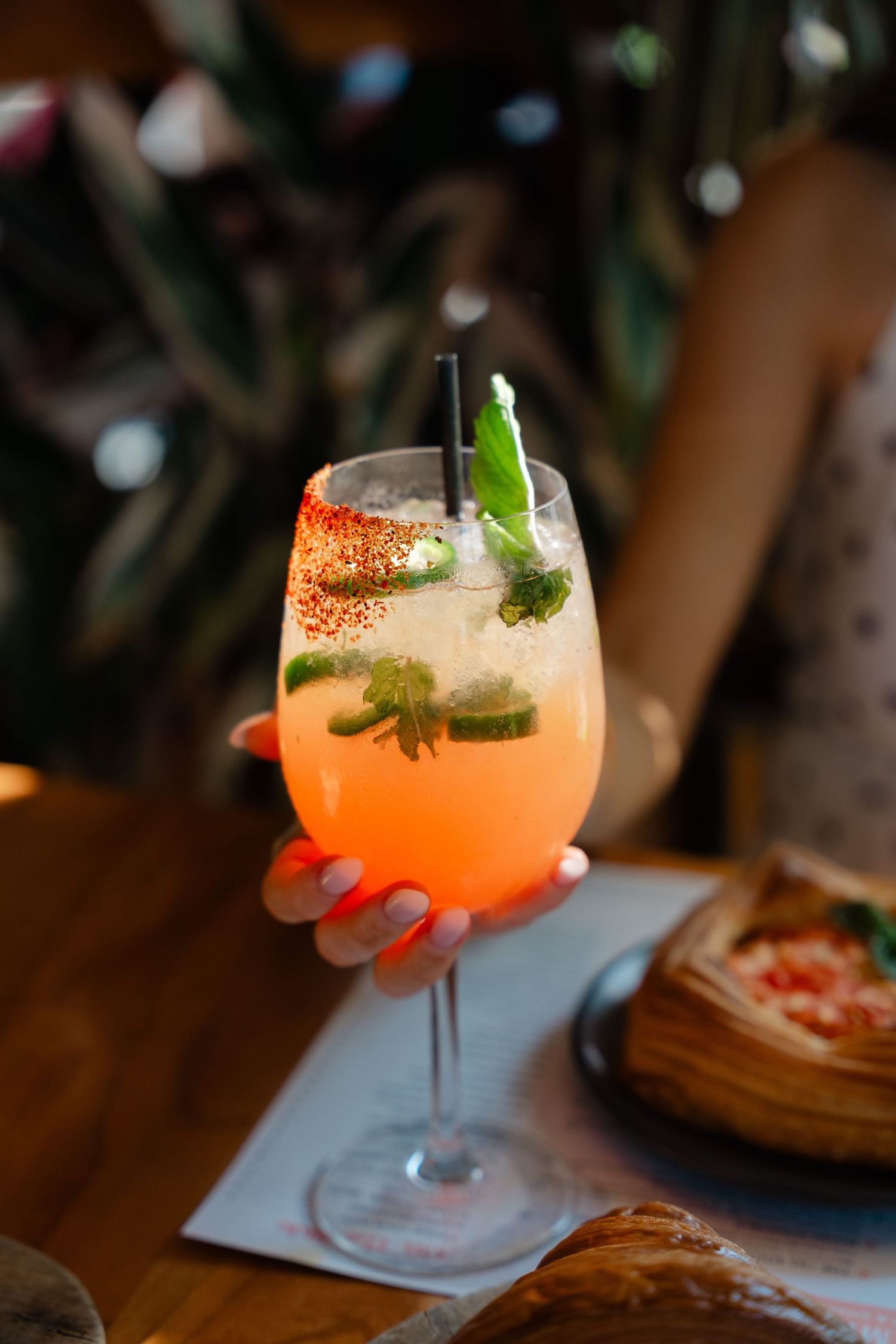 a cocktail glass on a table