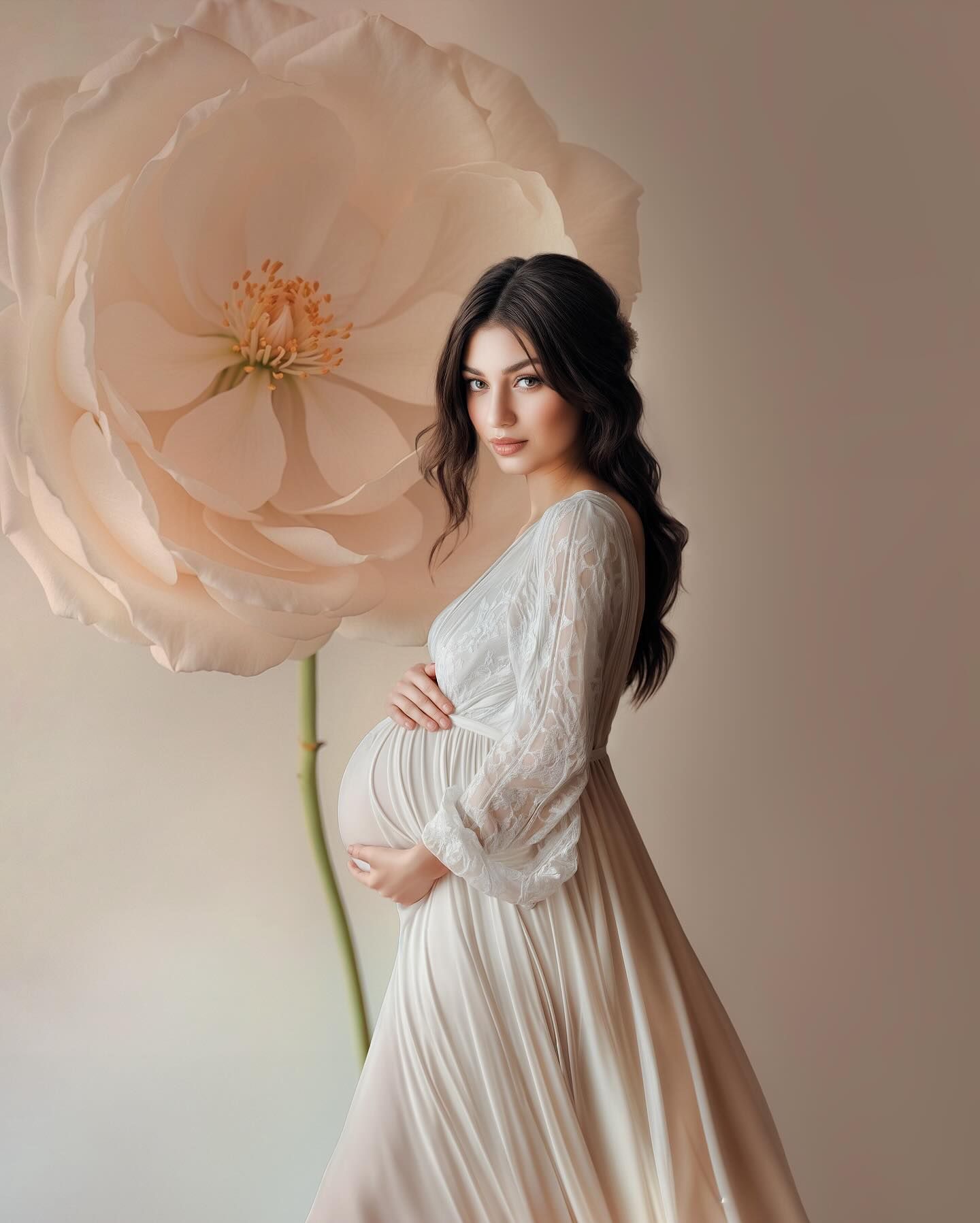 A series of romantic maternity photographs featuring soft pink flowers and a flowing white dress against a light neutral background.