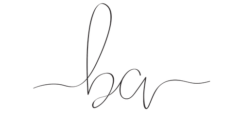 Elegant signature in black ink with flowing curves and flourishes.