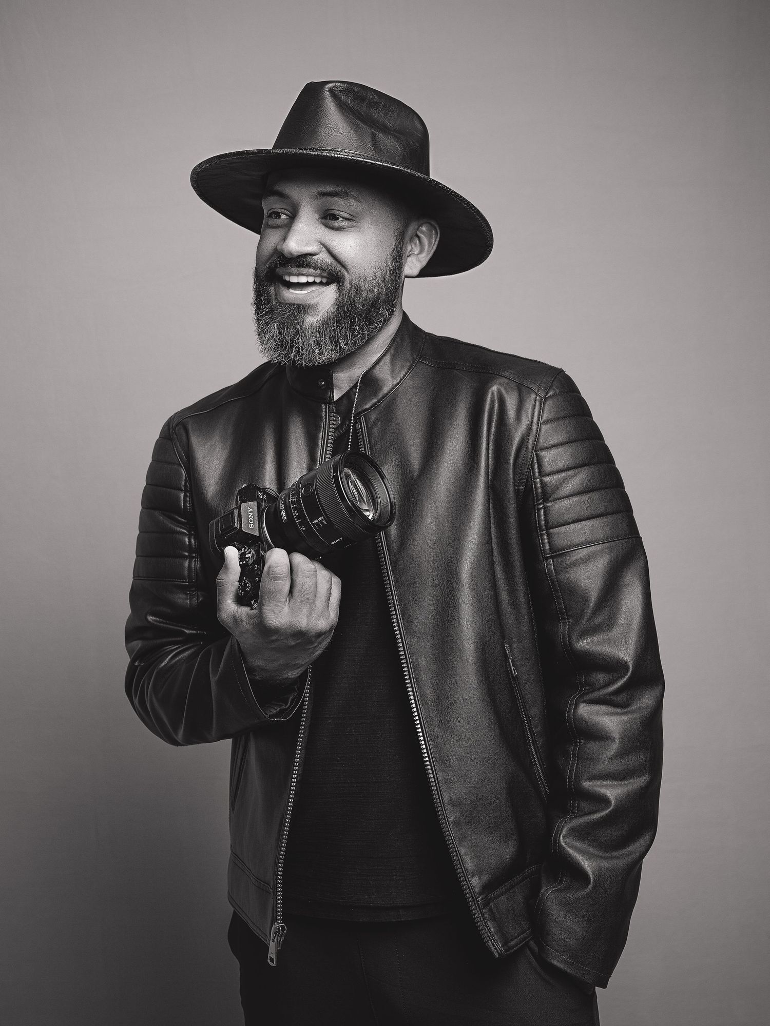 A series of black and white portraits showing Professional Photographer Peter Perez from Boudoir Art by Peter in Florida
