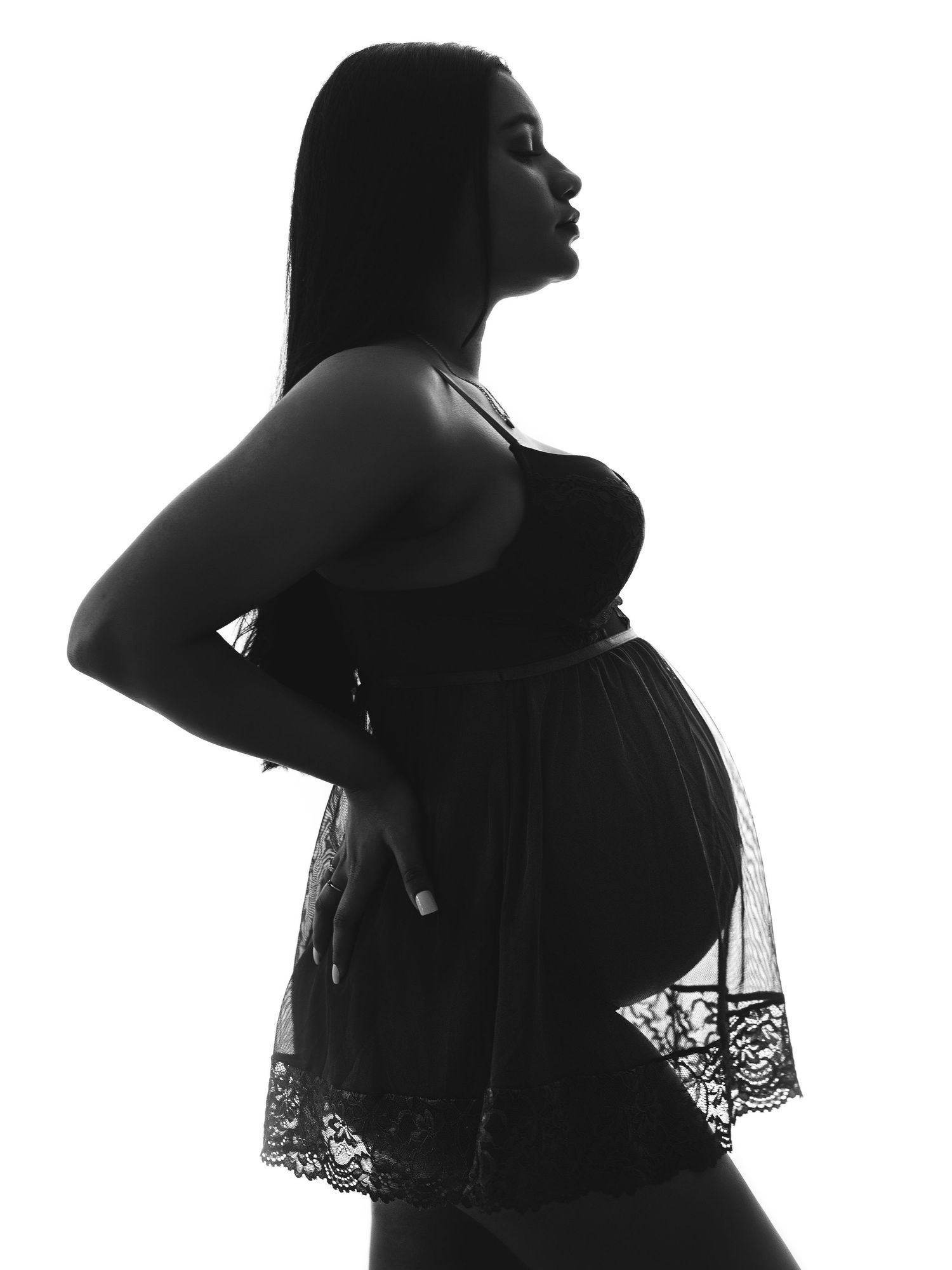 Silhouette series showing pregnant figures in elegant poses against white background.