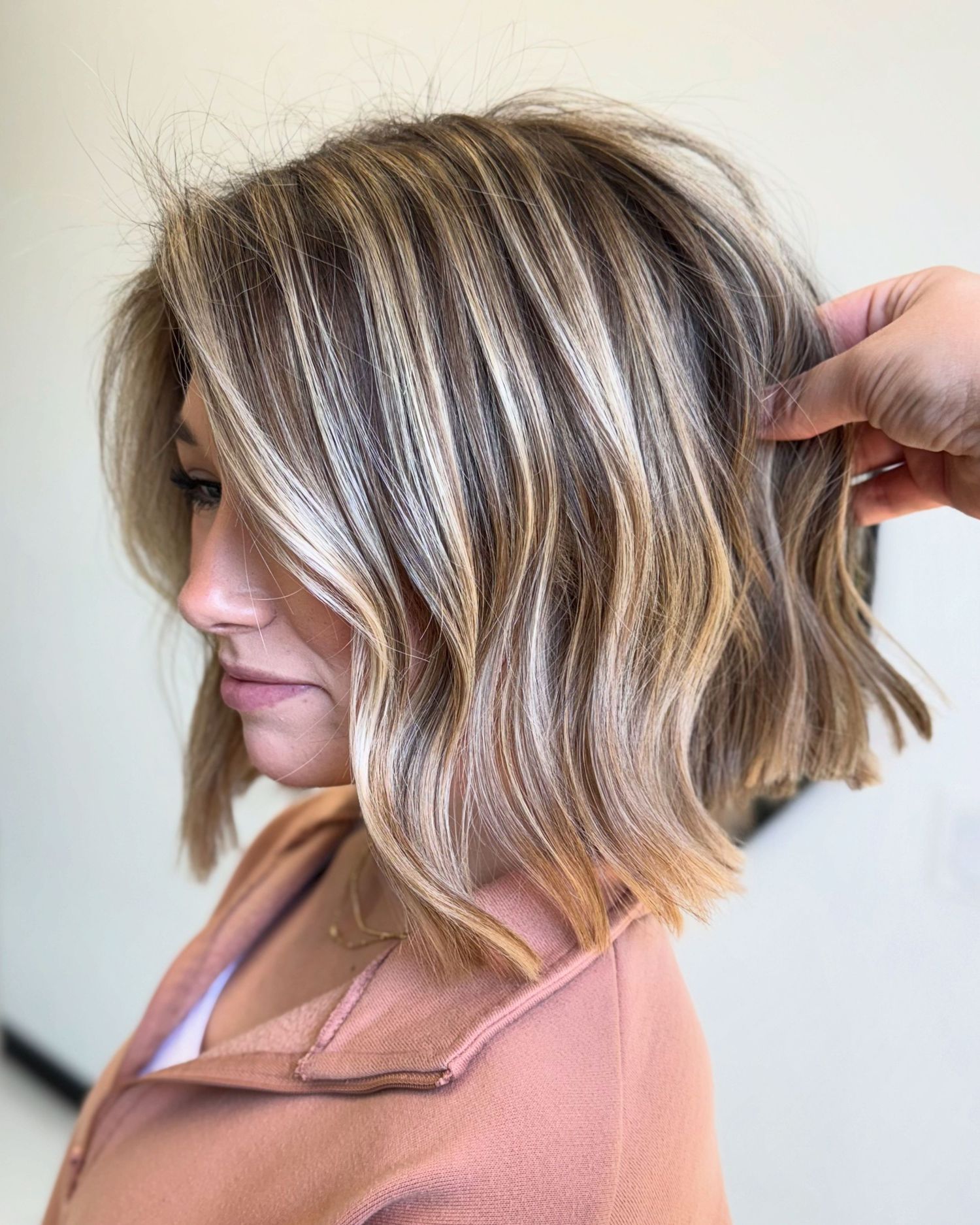 From balayage to extensions, Madilyn Wood creates effortless, dimensional hair that fits your vibe. Located in Fayetteville - now accepting