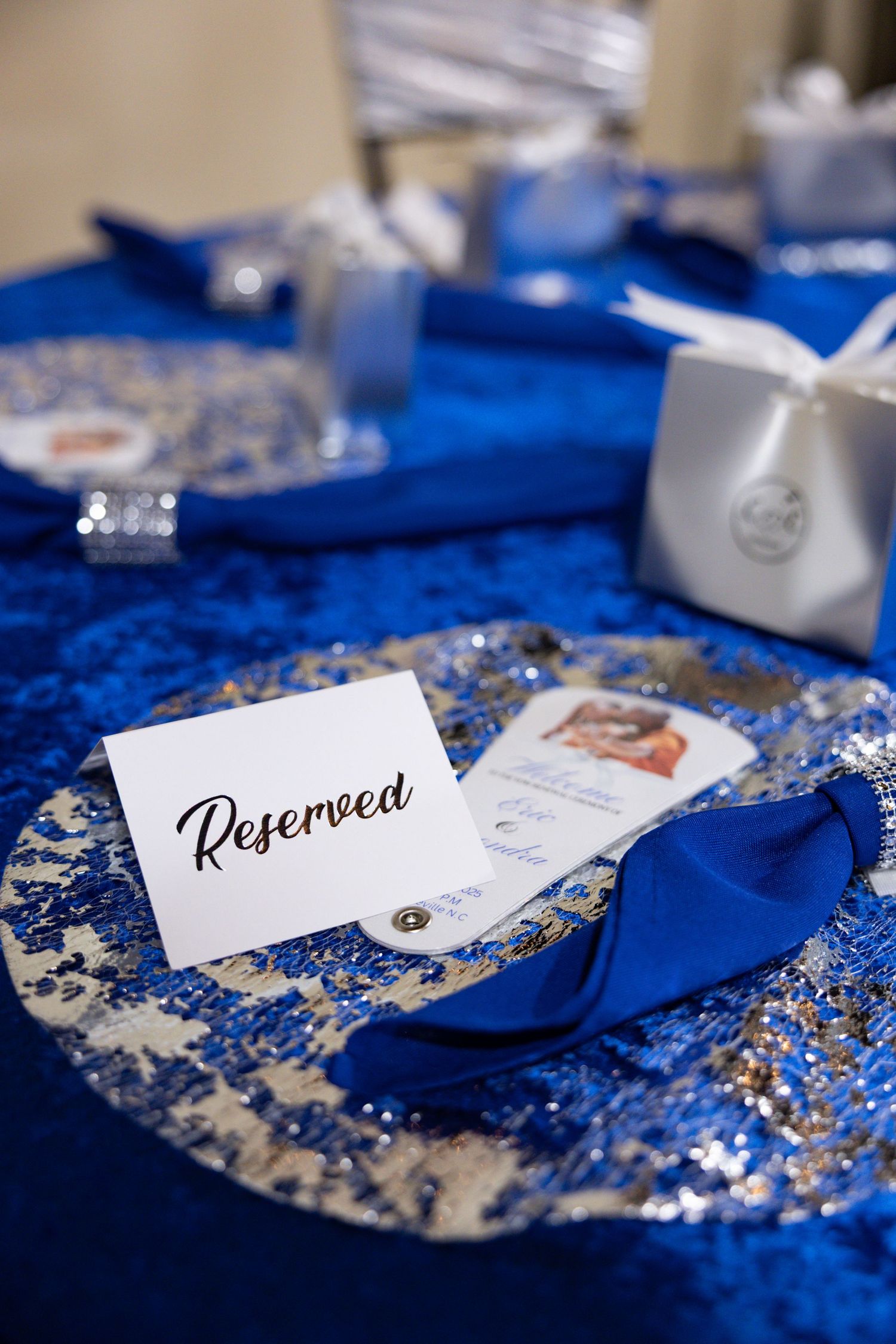 Wedding reception detail shot of table setting with name card by Carolina wedding photographer