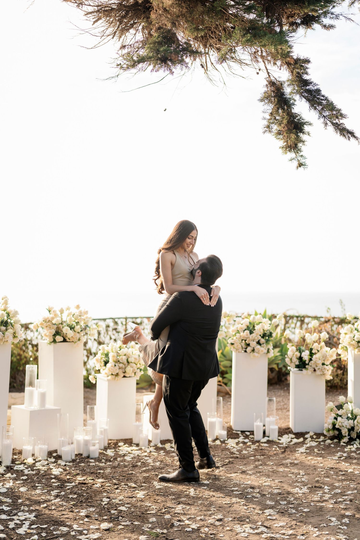A surprise proposal moment captured in sequence outdoors.