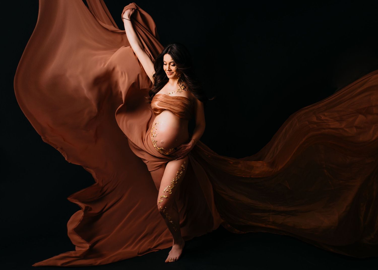 Fotografin aus Nürnberg für kreative Babybauchfotografie