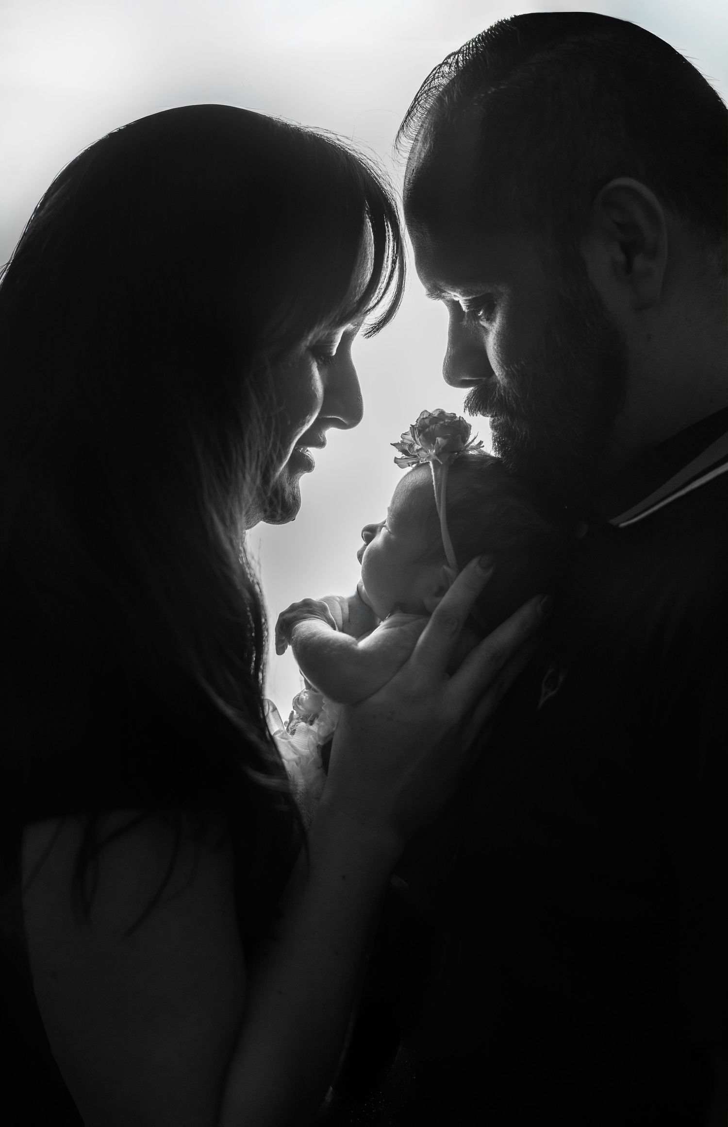 Mom, dad and baby newborn photography. Best newborn photographer in Long Beach.