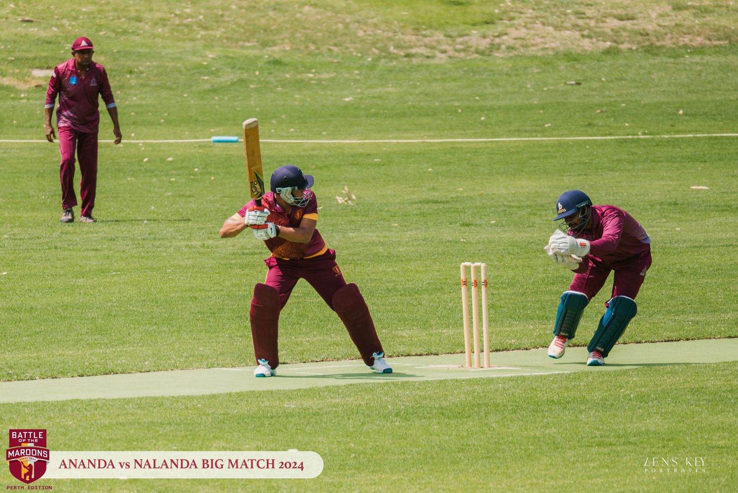 Cricket batsman playing a shot during Ananda vs Nalanda Big Match 2024 on a sunny day.