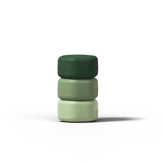 Four green cylindrical containers in varying shades arranged in a row against a white background.