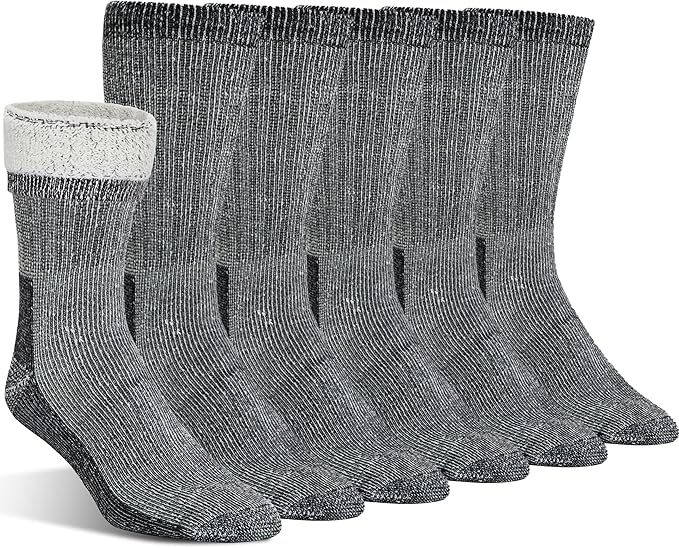 Six pairs of thick gray thermal crew socks with moisture wicking properties arranged in a row.