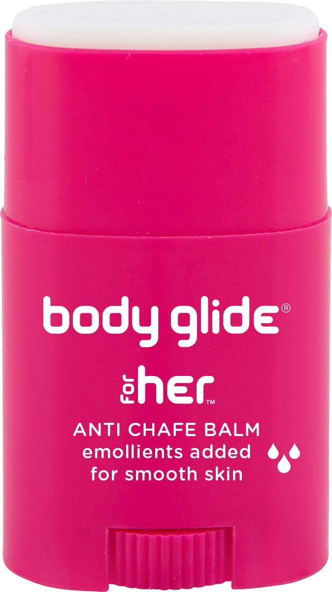 Body Glide For Her anti-chafe balm in bright pink packaging shown from different angles emphasizing smooth skin benefits.