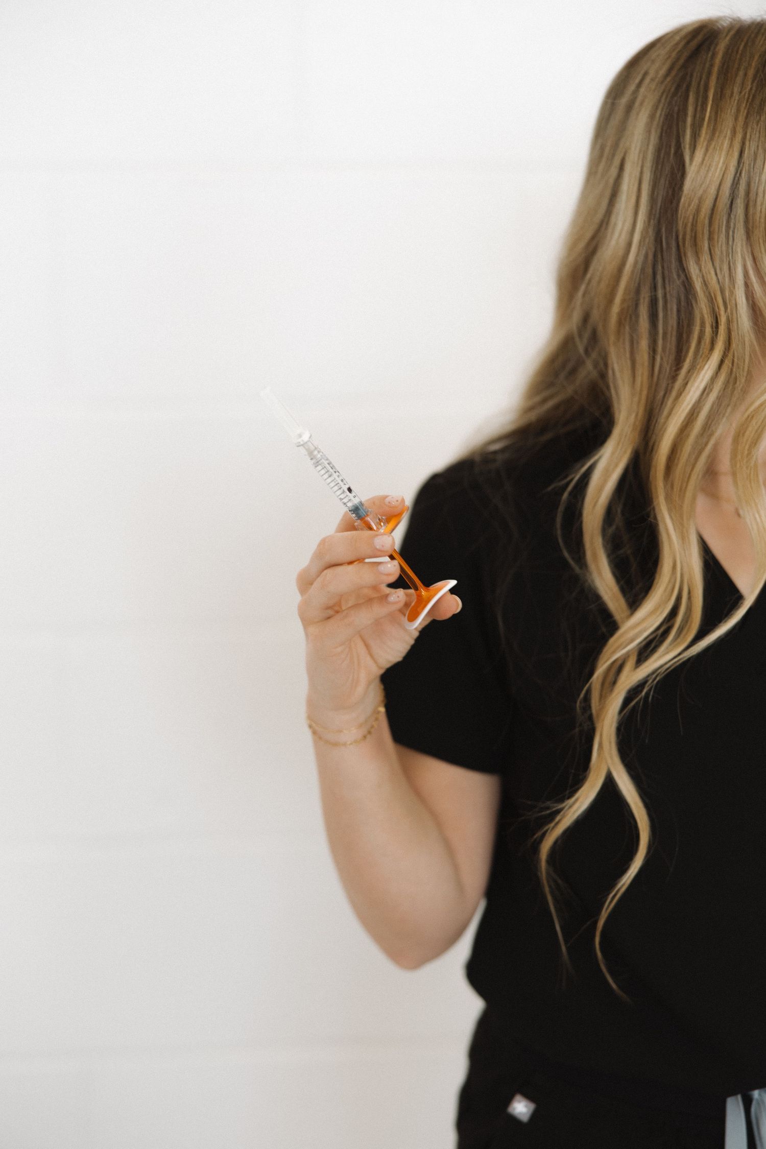 Artistic side profile shots showing hands holding medical products.