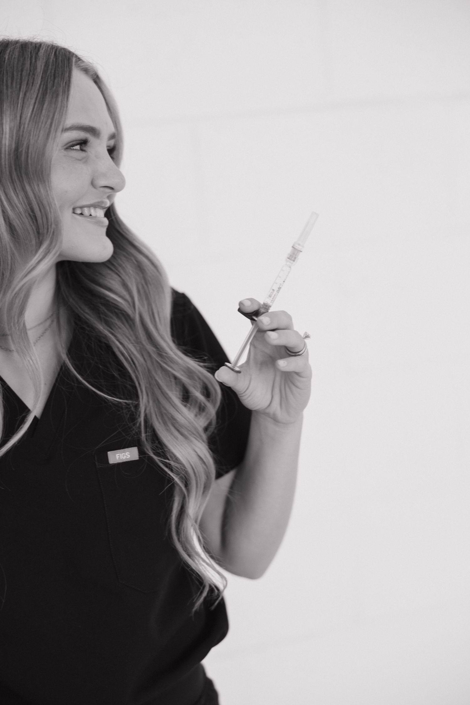 Series of profile shots showing person holding medical products in monochrome setting.