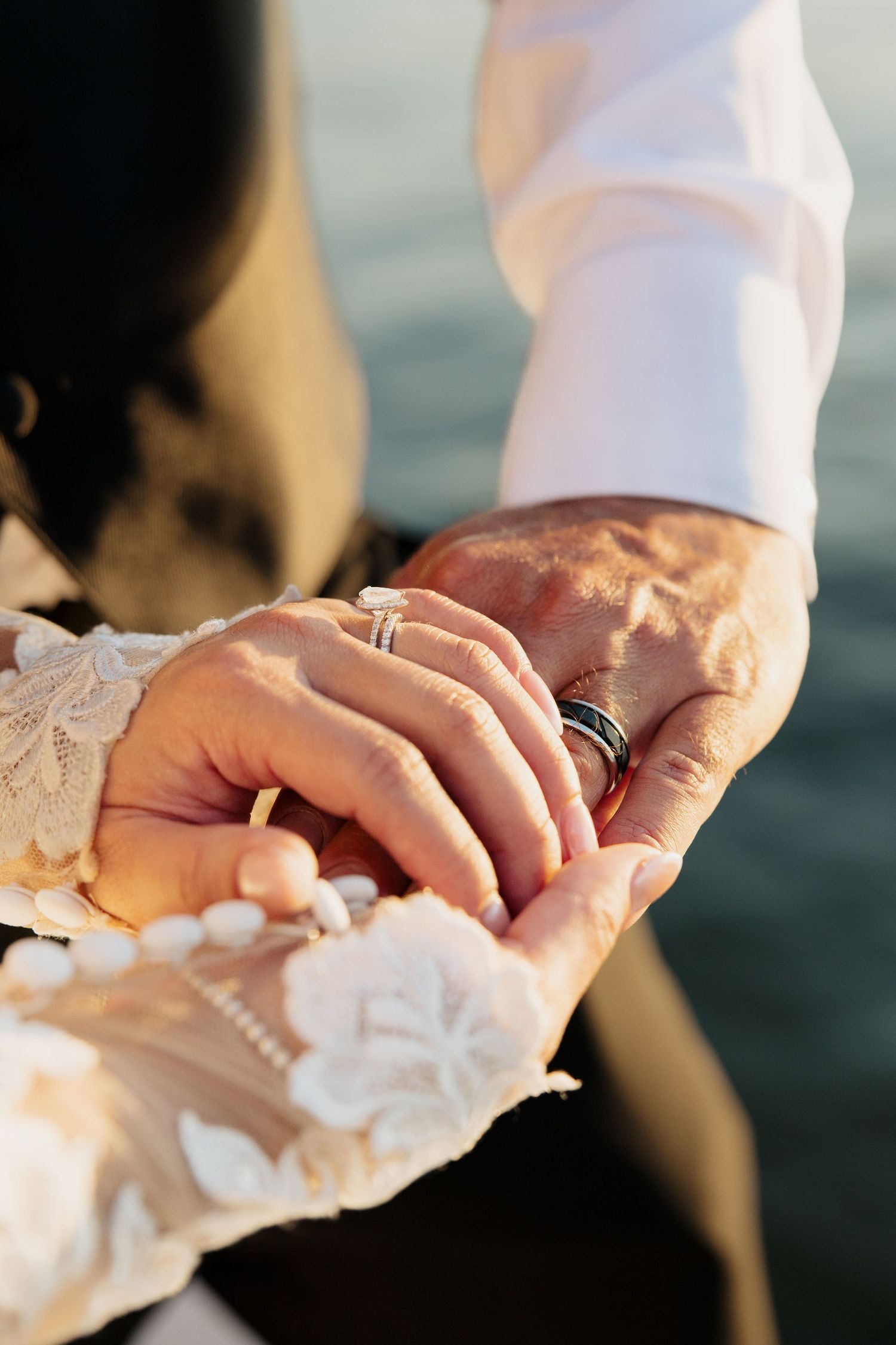 Close-up series of hands wearing wedding rings and white lace, symbolizing marriage and commitment.